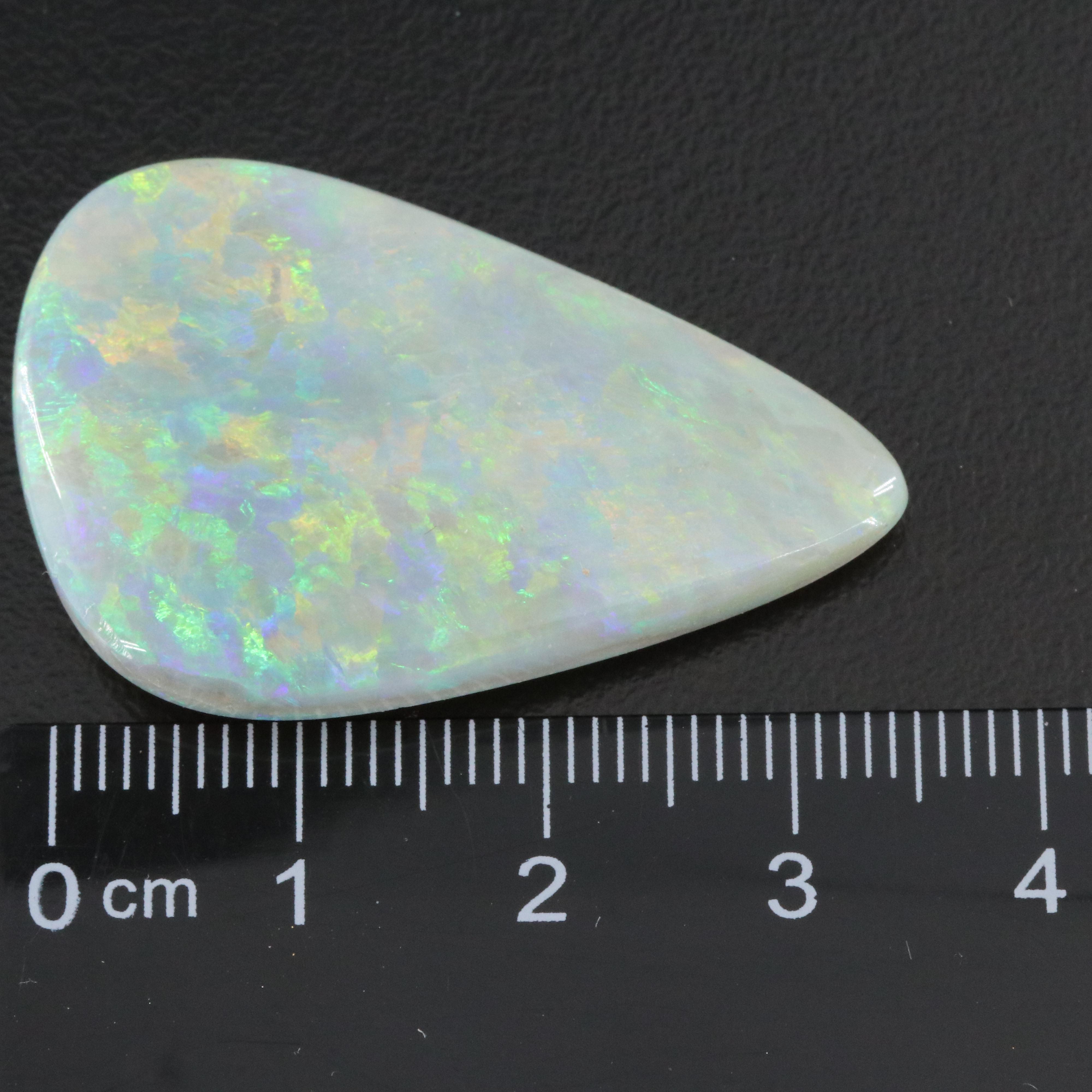 Loose Gemstone Lot Including Coral, Malachite and Amethyst