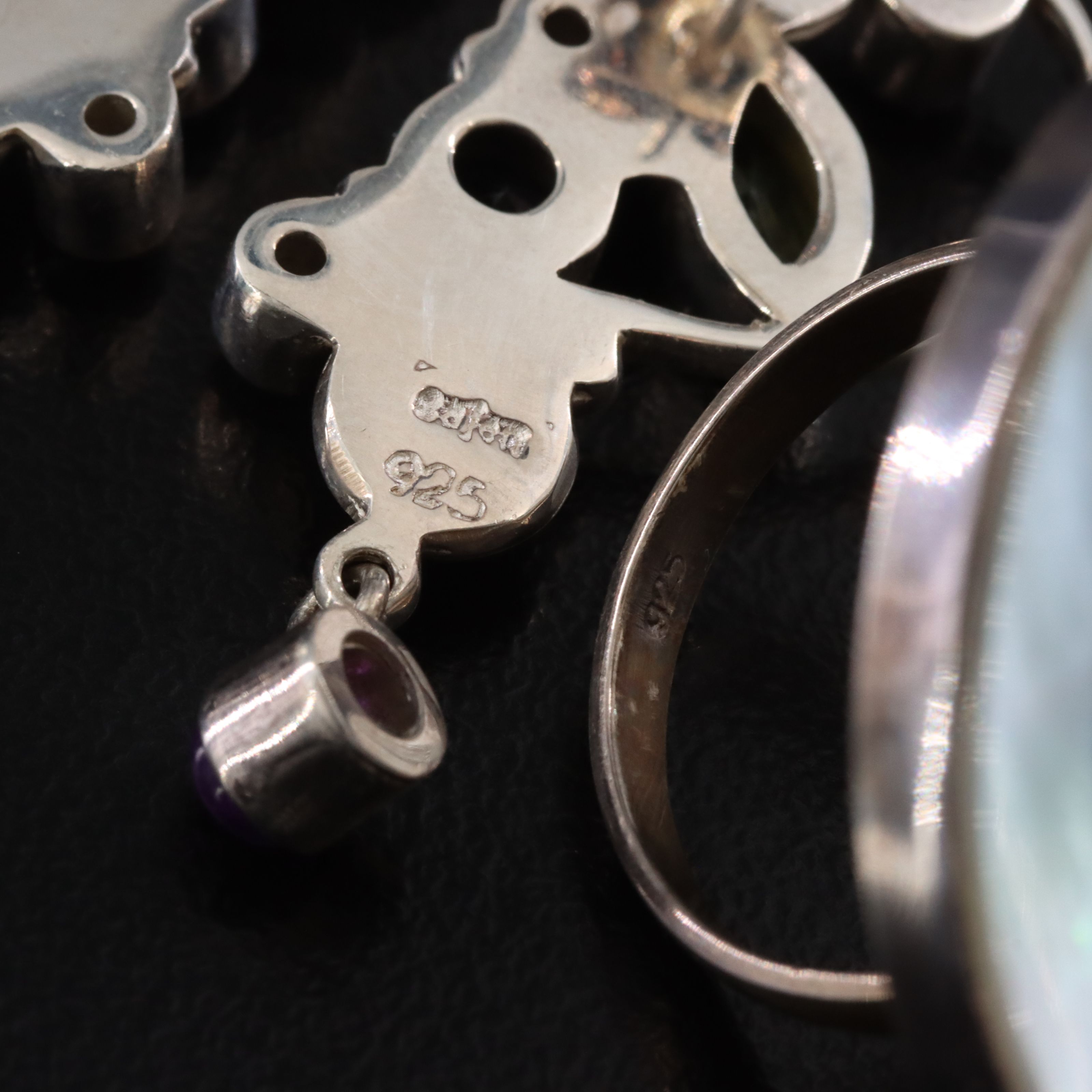 Sajen Sterling Earrings with Figural Ring and Gemstones