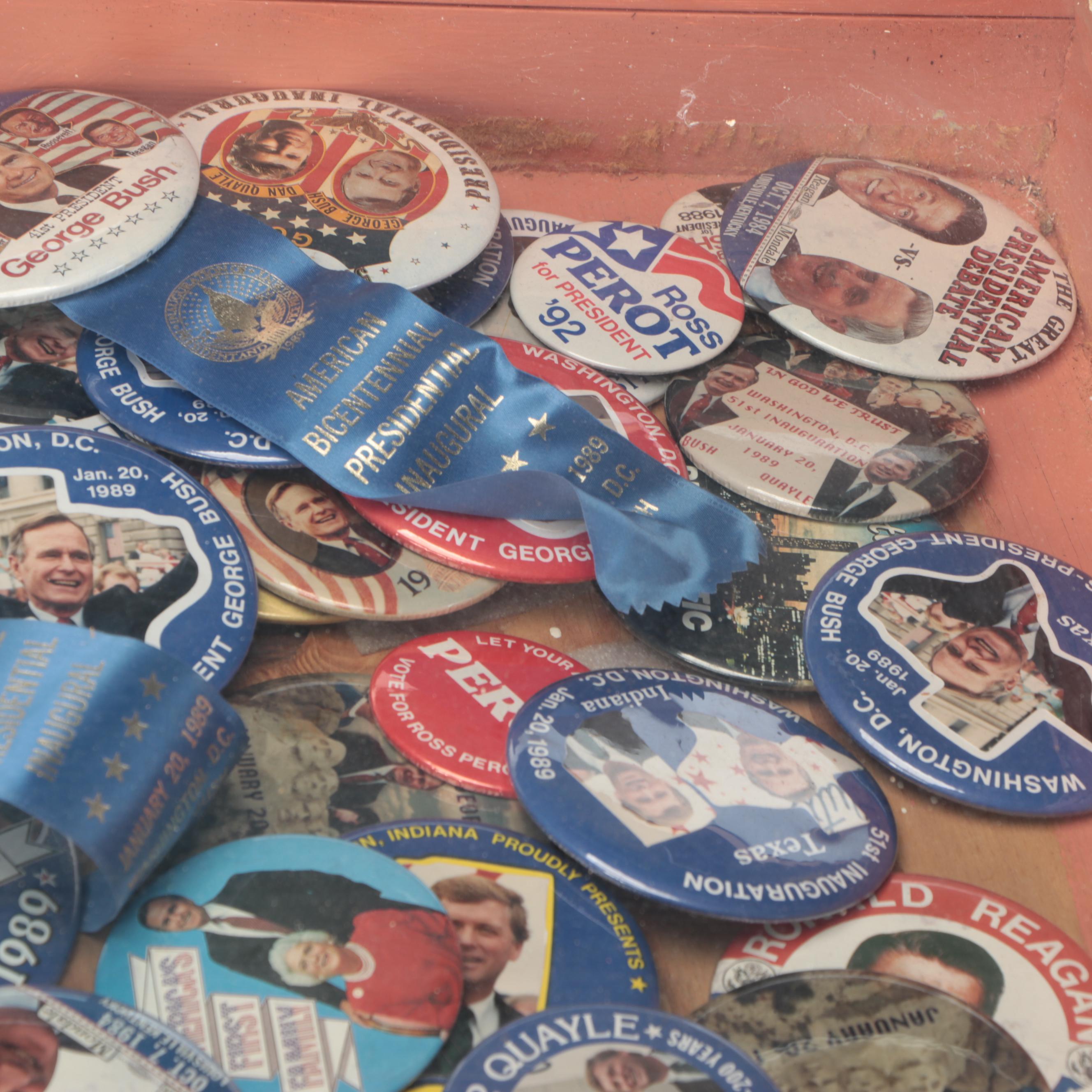 Assortment of Political Campaign Pushback Pins in Wood Cabinet