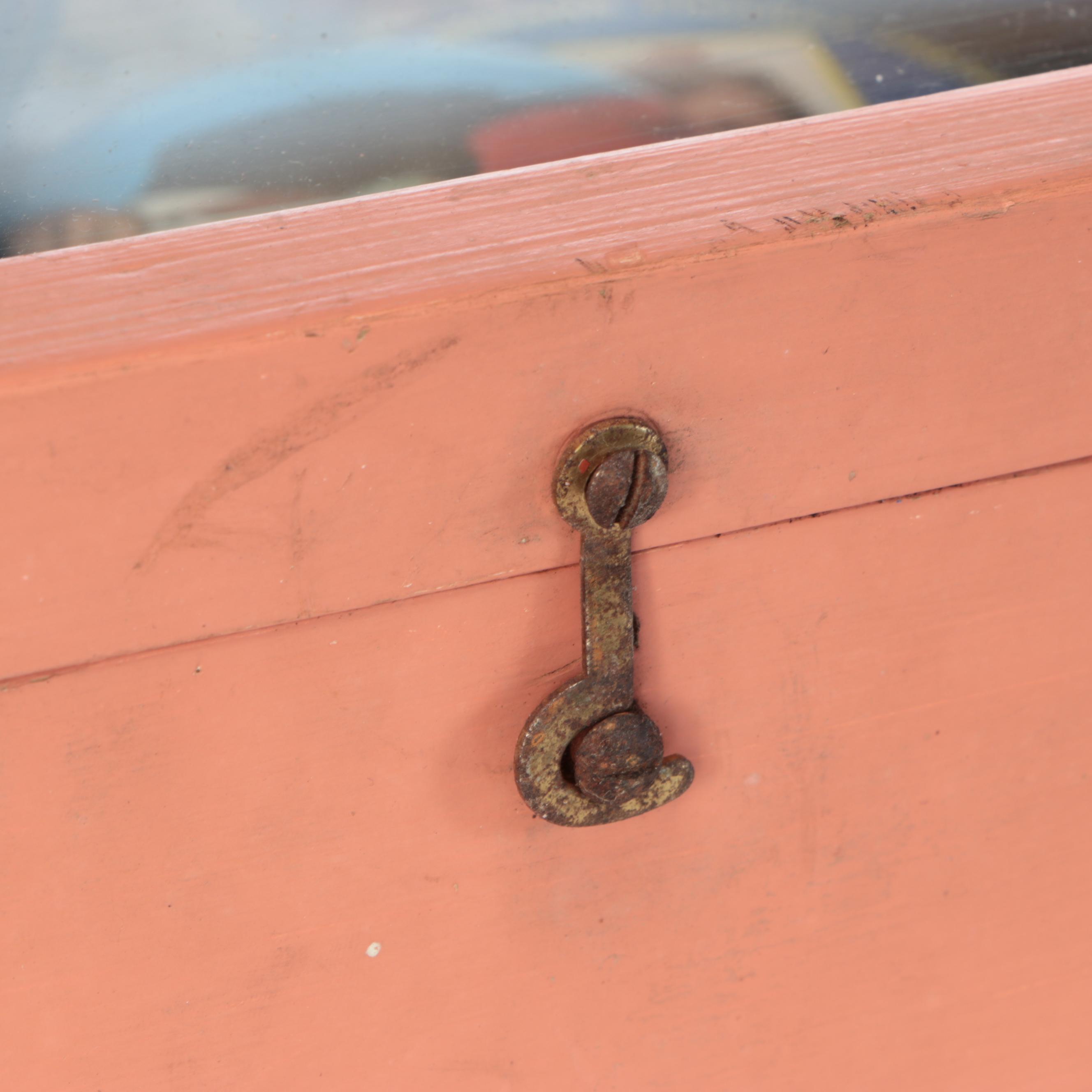 Assortment of Political Campaign Pushback Pins in Wood Cabinet