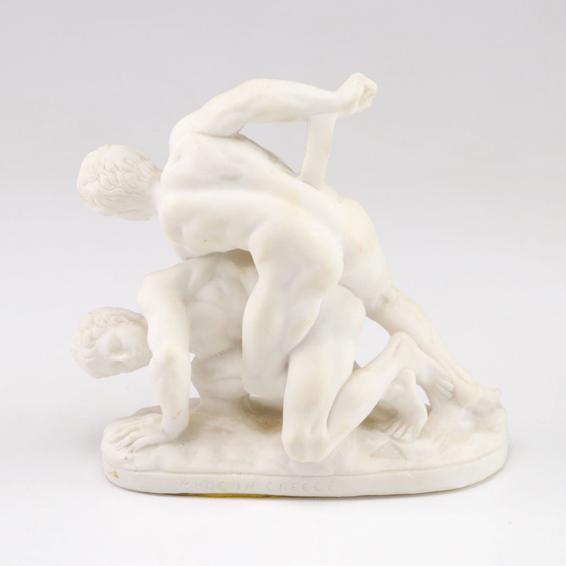 Greek "The Wrestlers" Marble Replica Statue with Modern Italian Ceramic Goblets