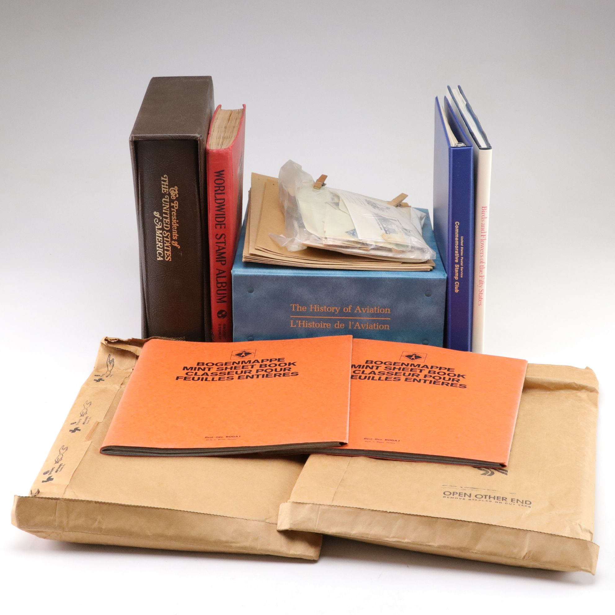 "History of Aviation", "Worldwide Stamp Album", and More Postage Stamps
