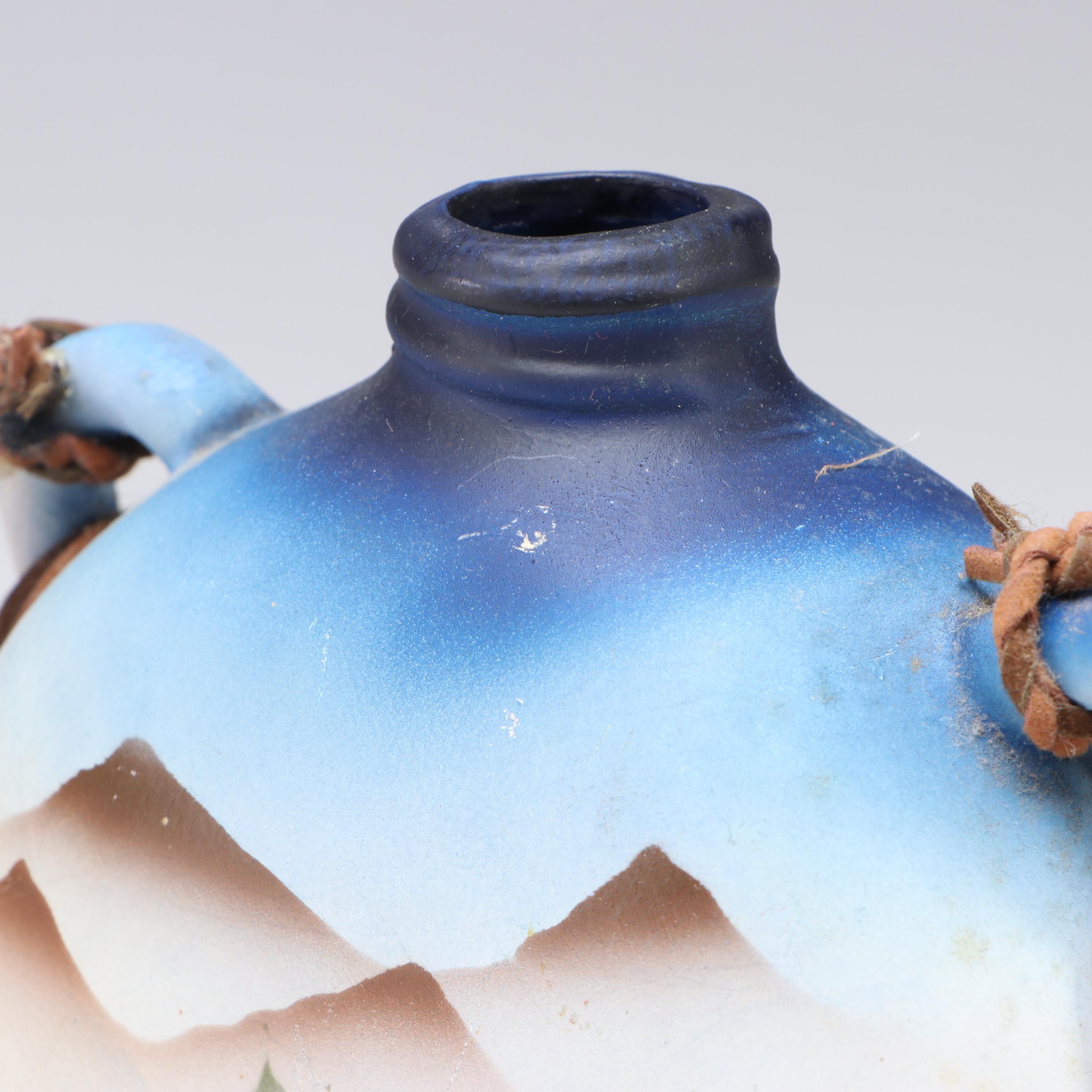 Figural Saddle Mantel Clock with Ceramic Vases and Other Southwest Décor