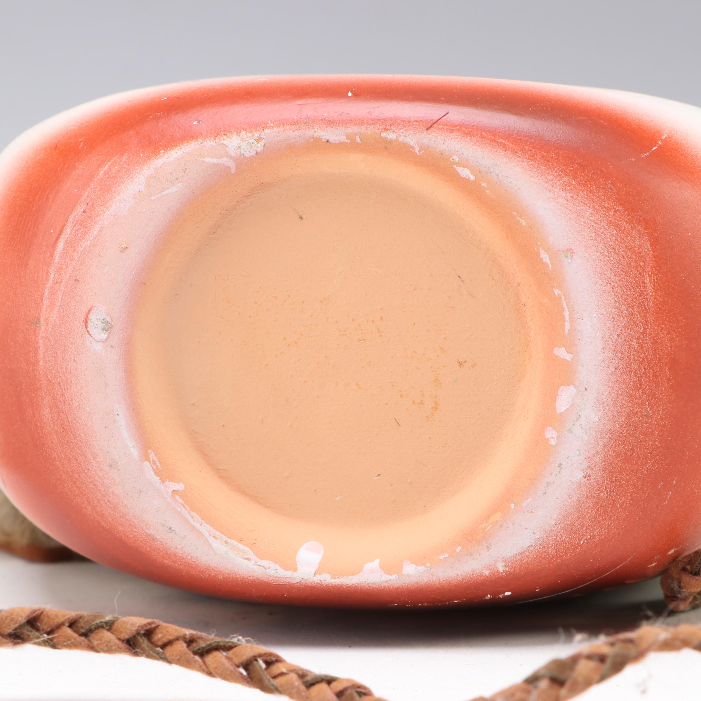 Figural Saddle Mantel Clock with Ceramic Vases and Other Southwest Décor