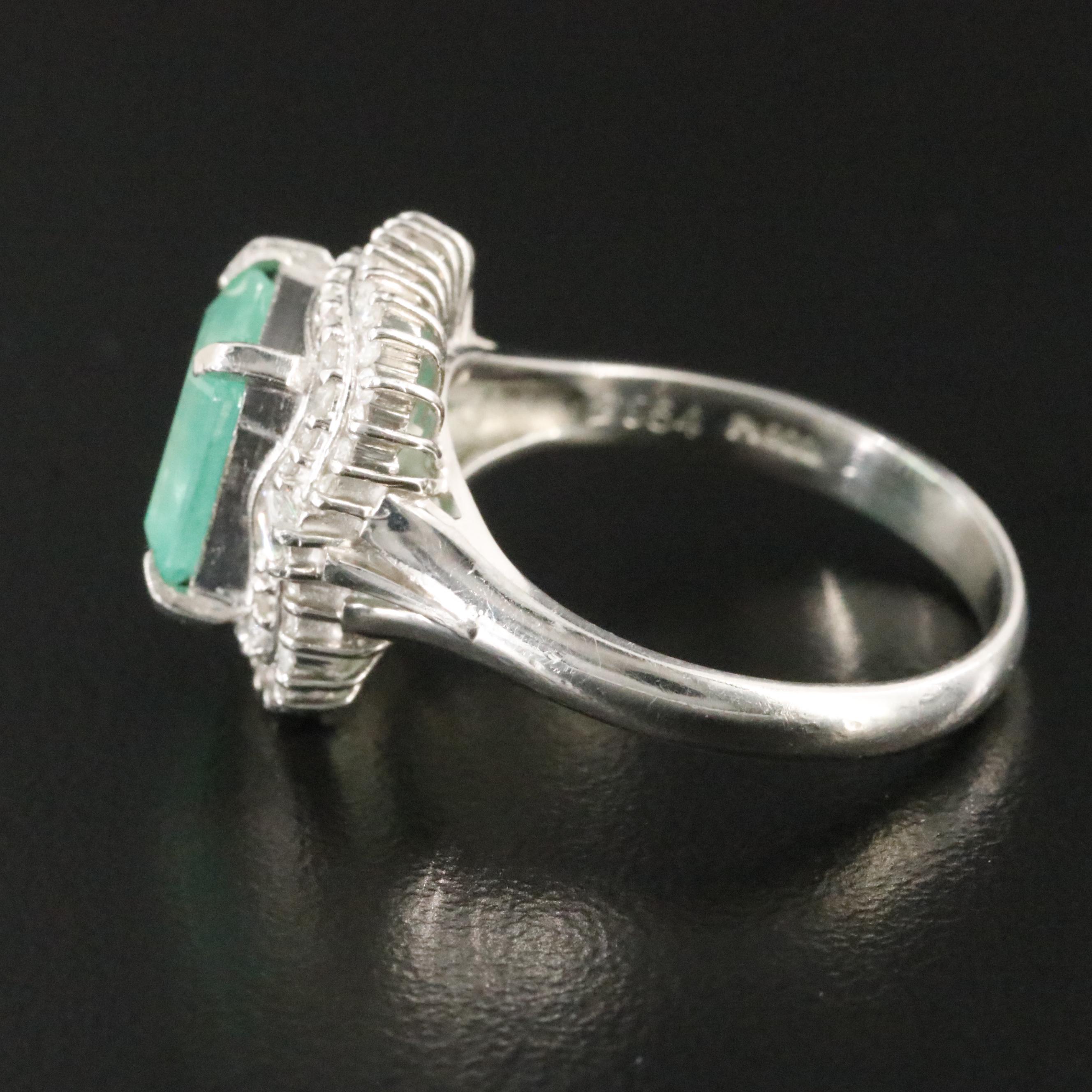 Platinum 2.05 CT Emerald and Diamond Ring