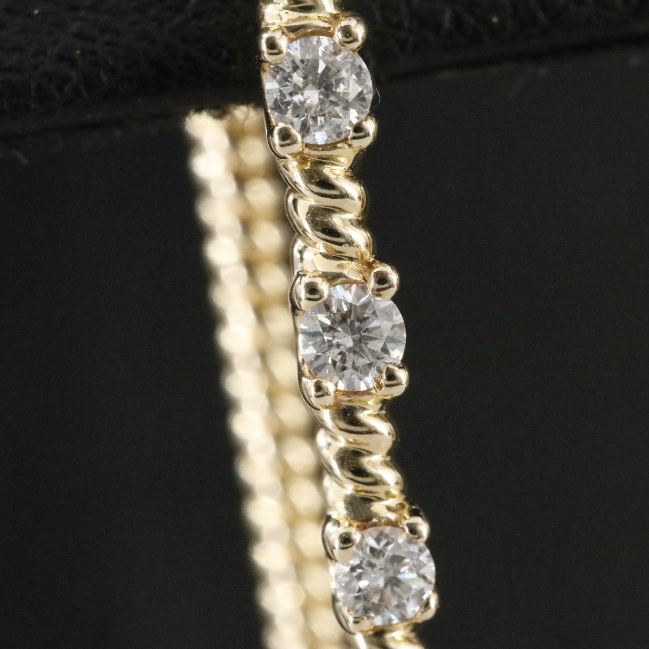 10K 0.50 CTW Diamond Oval Hoop Earrings