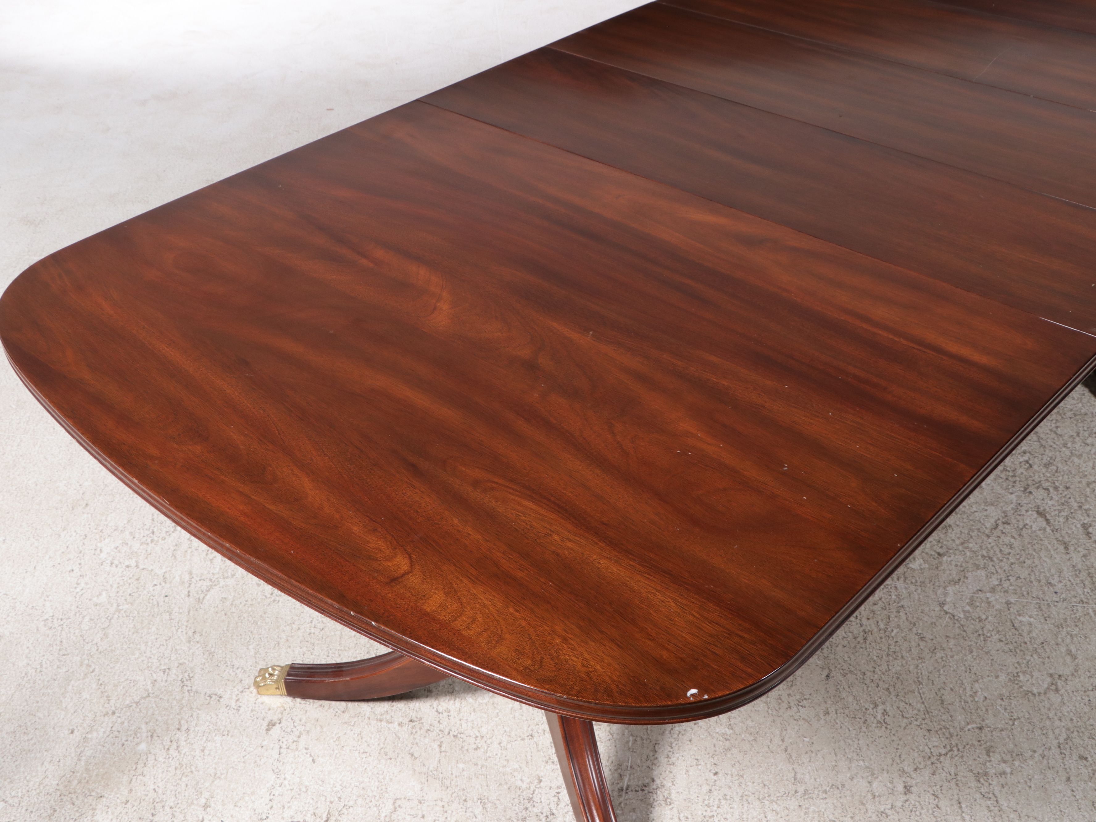 Thirteen-Piece Mahogany Dining Set with Henkel-Harris Chippendale Style Chairs