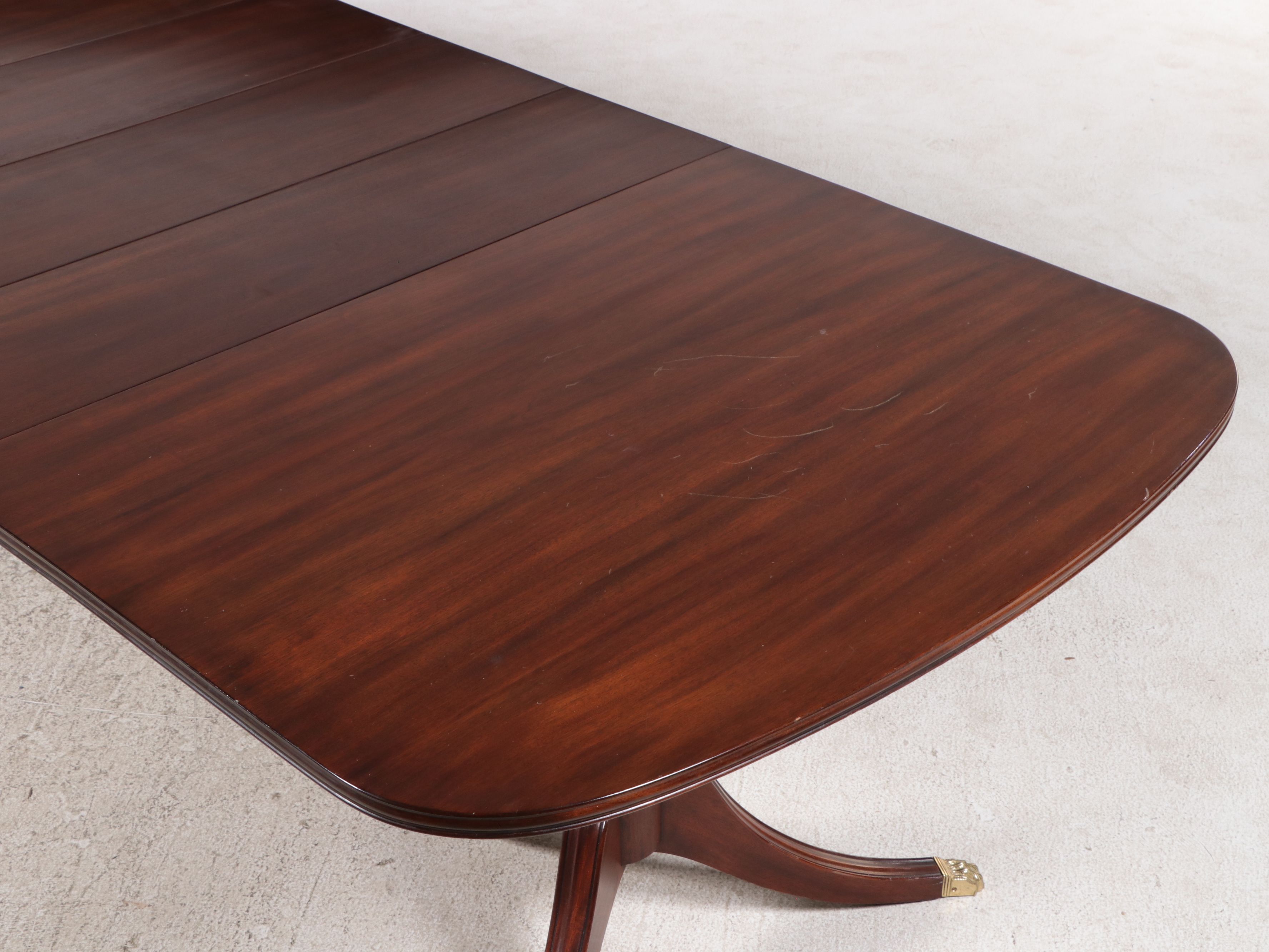 Thirteen-Piece Mahogany Dining Set with Henkel-Harris Chippendale Style Chairs