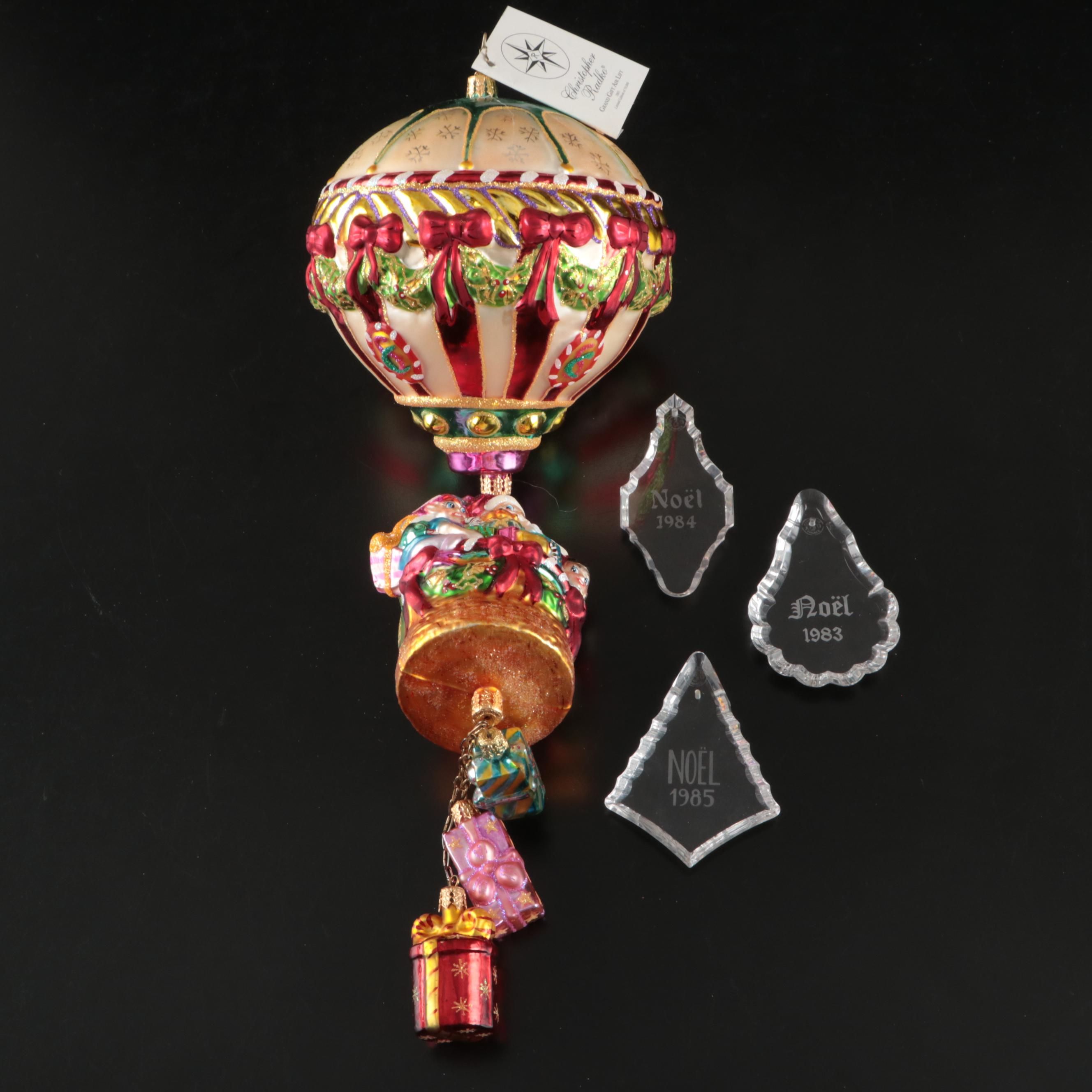Christopher Radko "Grand Gift Air Lift" with Baccarat Crystal Annual Ornaments