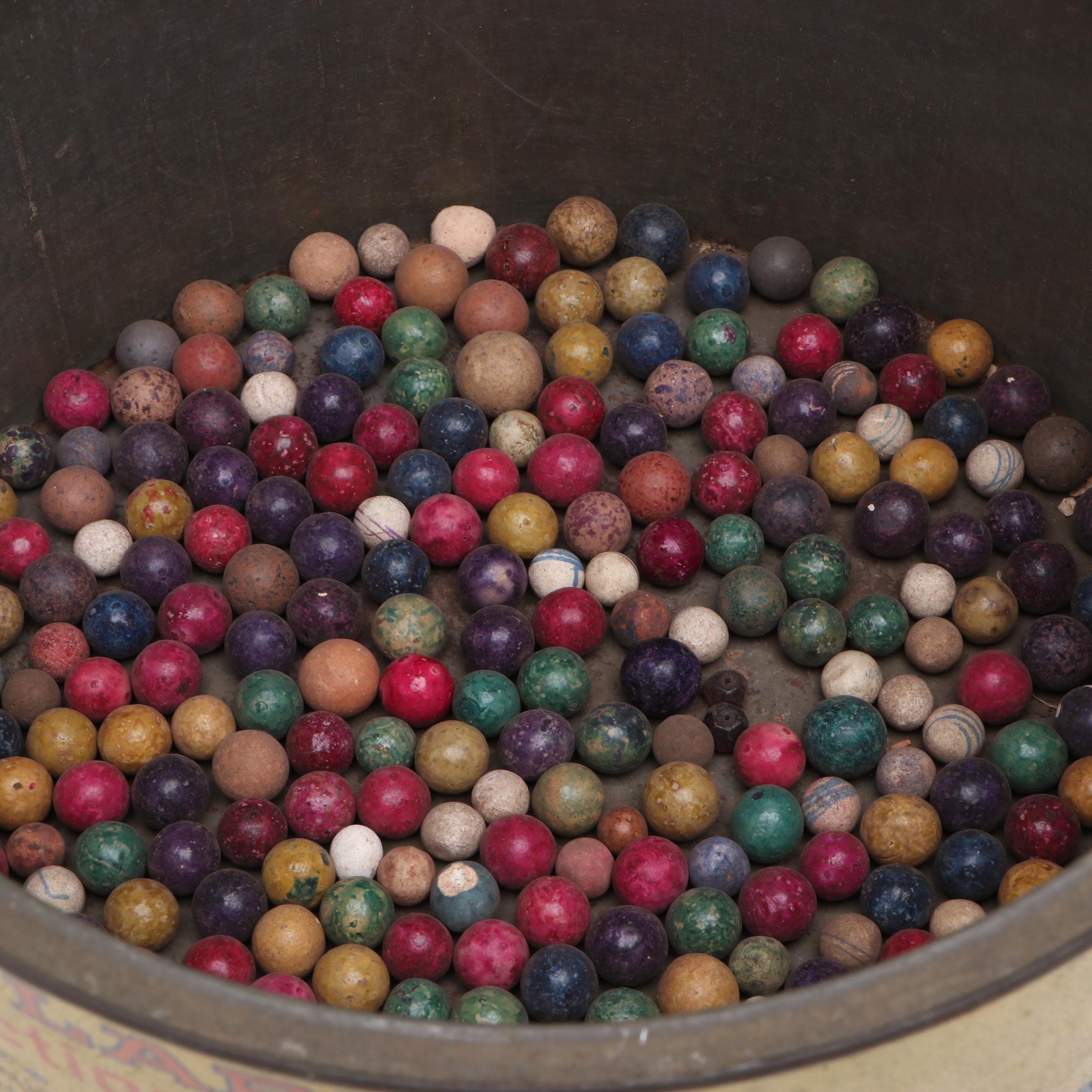 Clark's Confections Tin with Clay Marbles and Other Collectibles