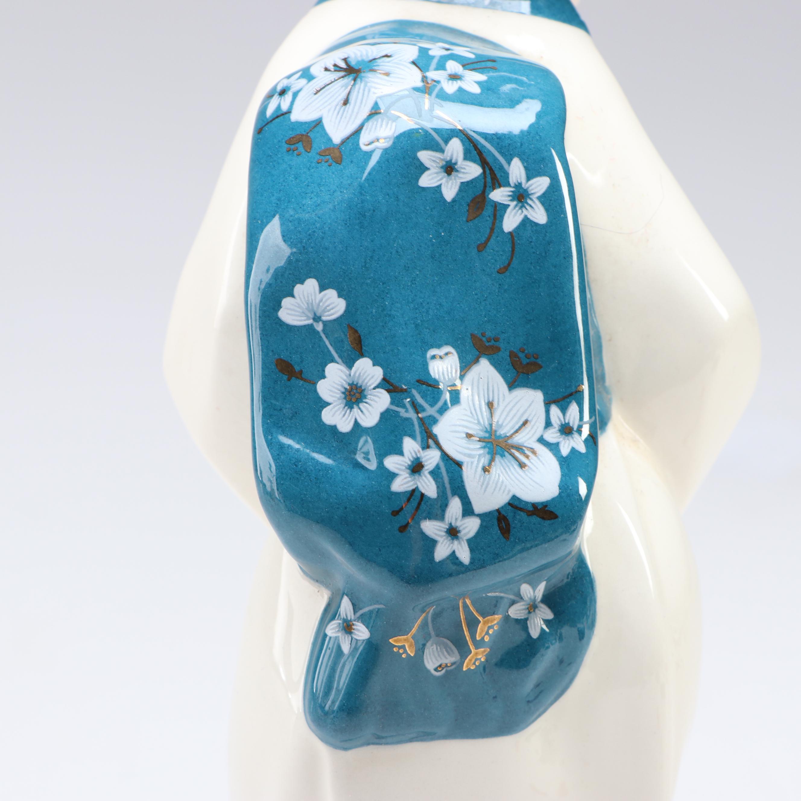 Asian Style Bowing Lady Ceramic Figurine