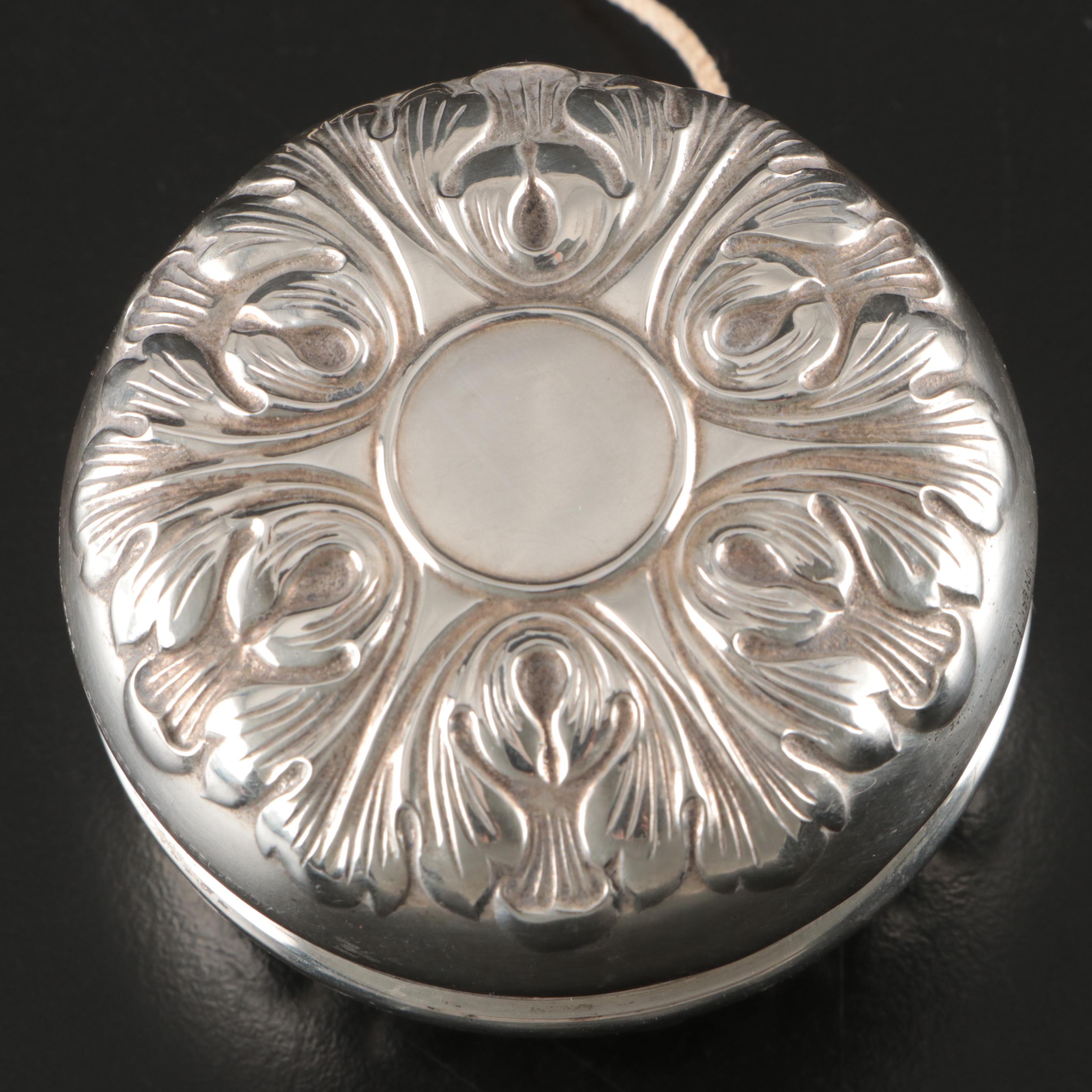 Gorham Repoussé Sterling Silver Yo-Yo, 20th Century