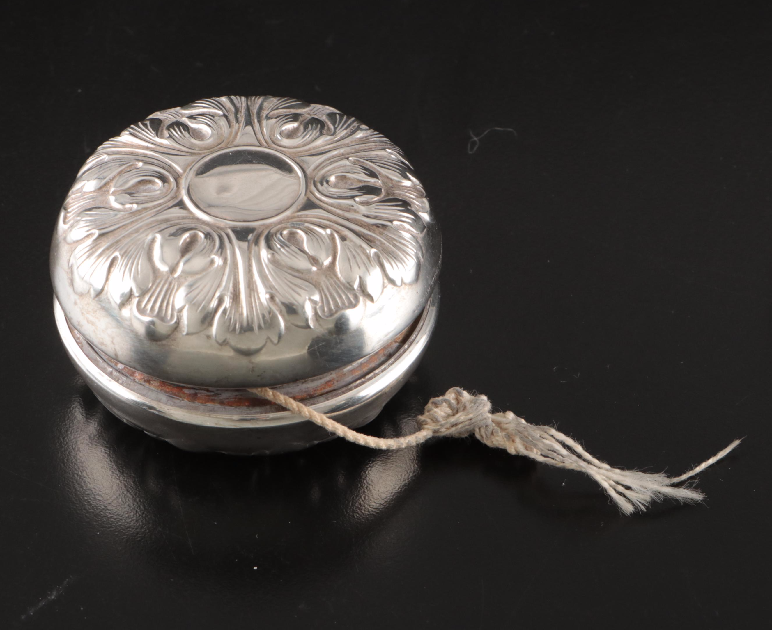 Gorham Repoussé Sterling Silver Yo-Yo, 20th Century