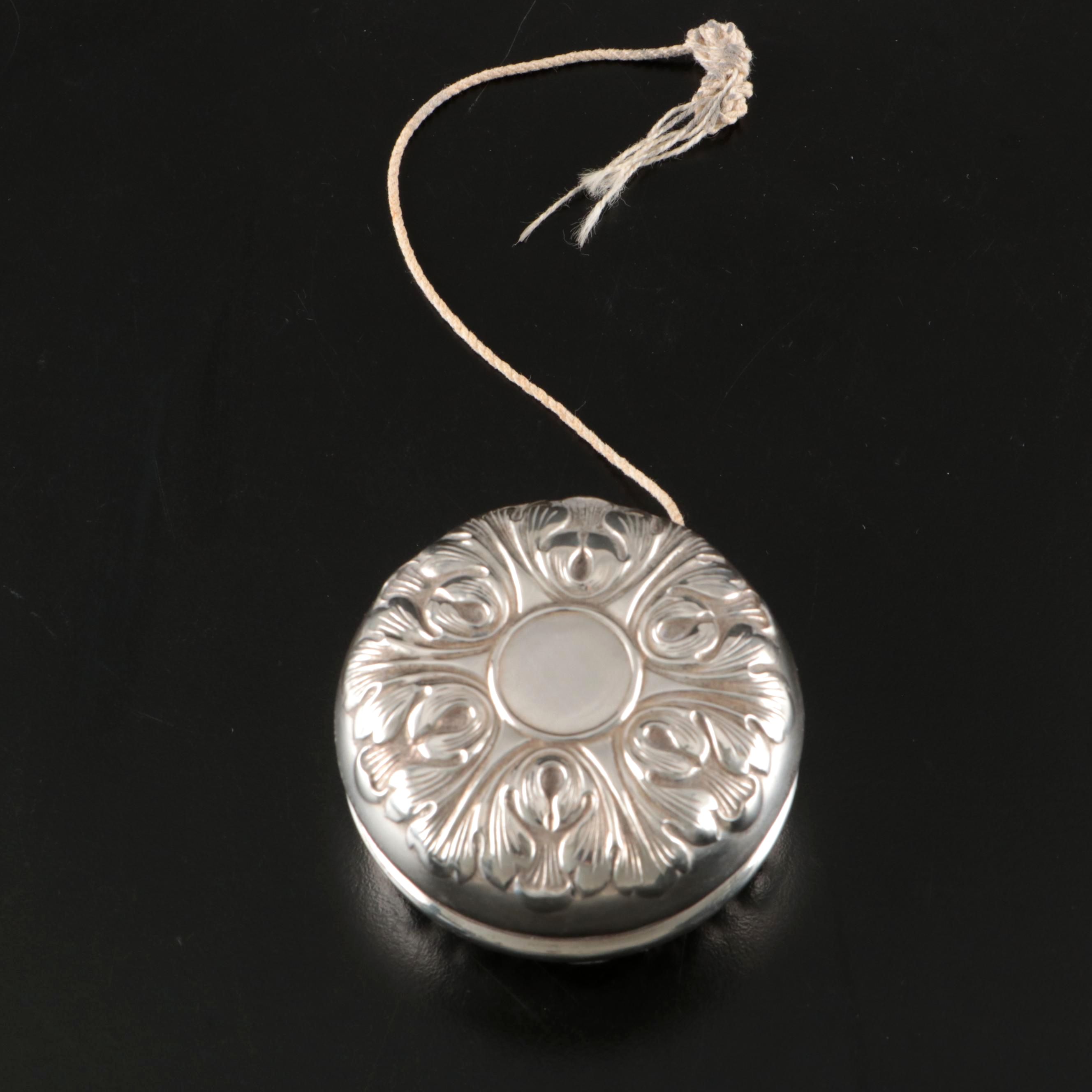 Gorham Repoussé Sterling Silver Yo-Yo, 20th Century