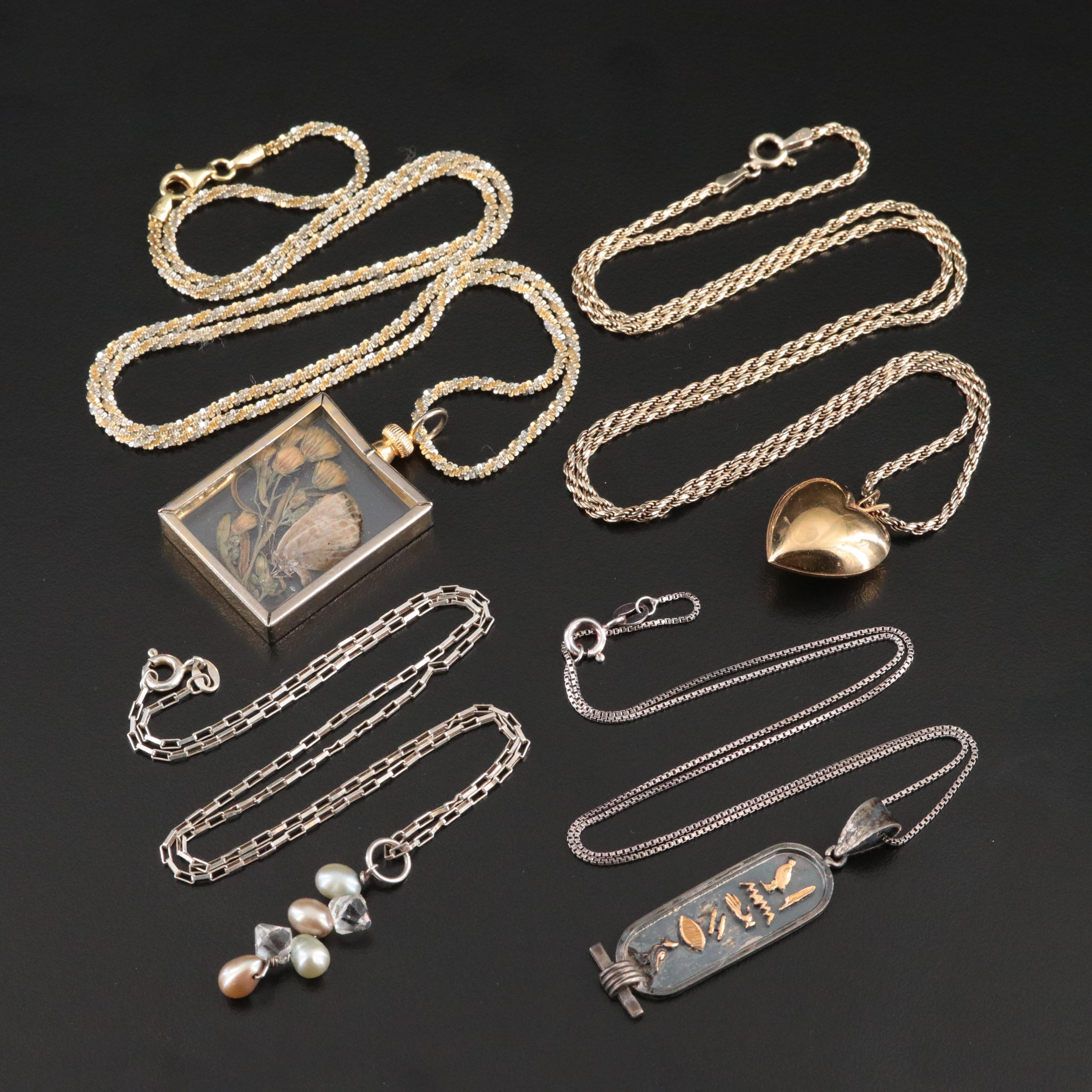 Sterling Chains with Assorted Pendants Featured in Jewelry Collection