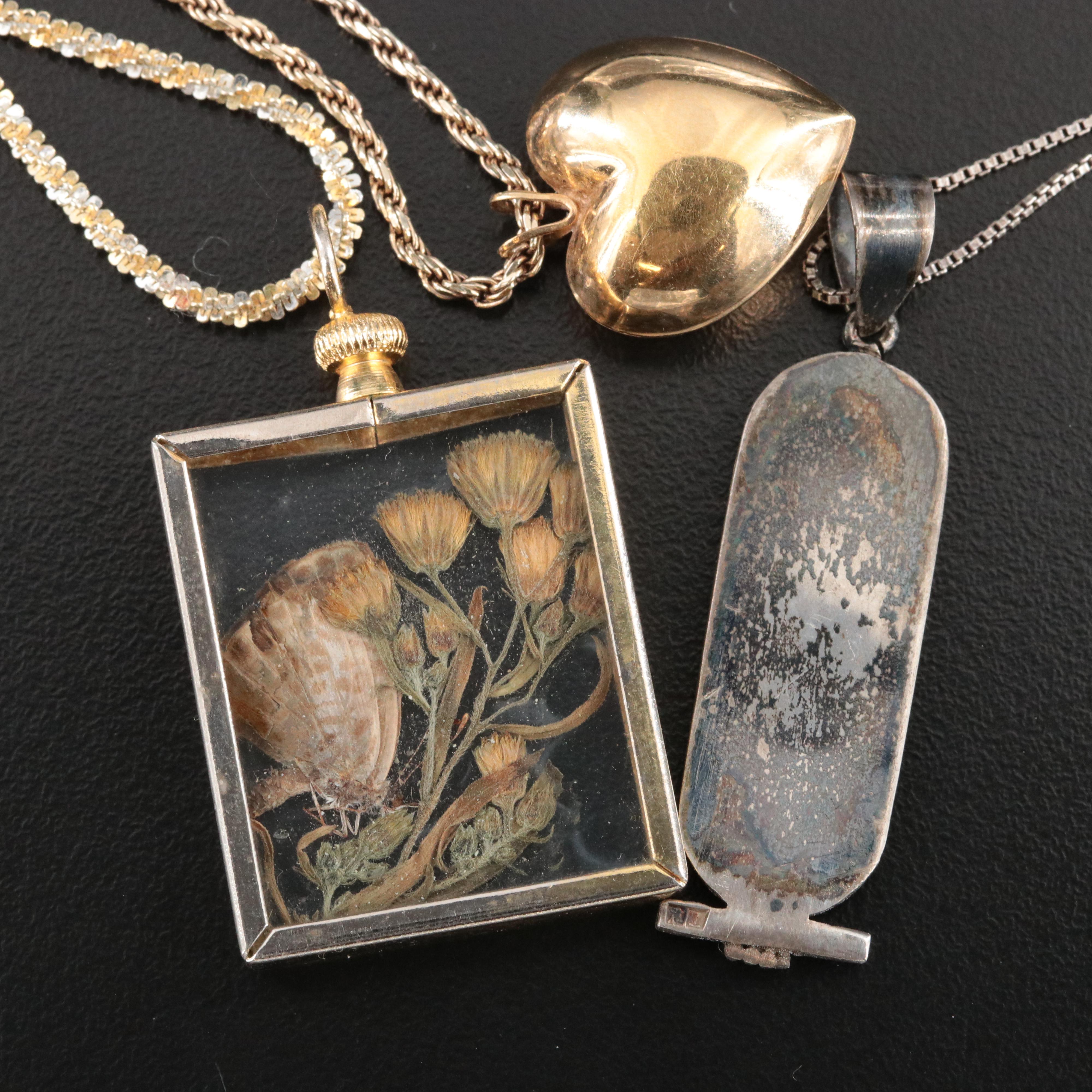 Sterling Chains with Assorted Pendants Featured in Jewelry Collection