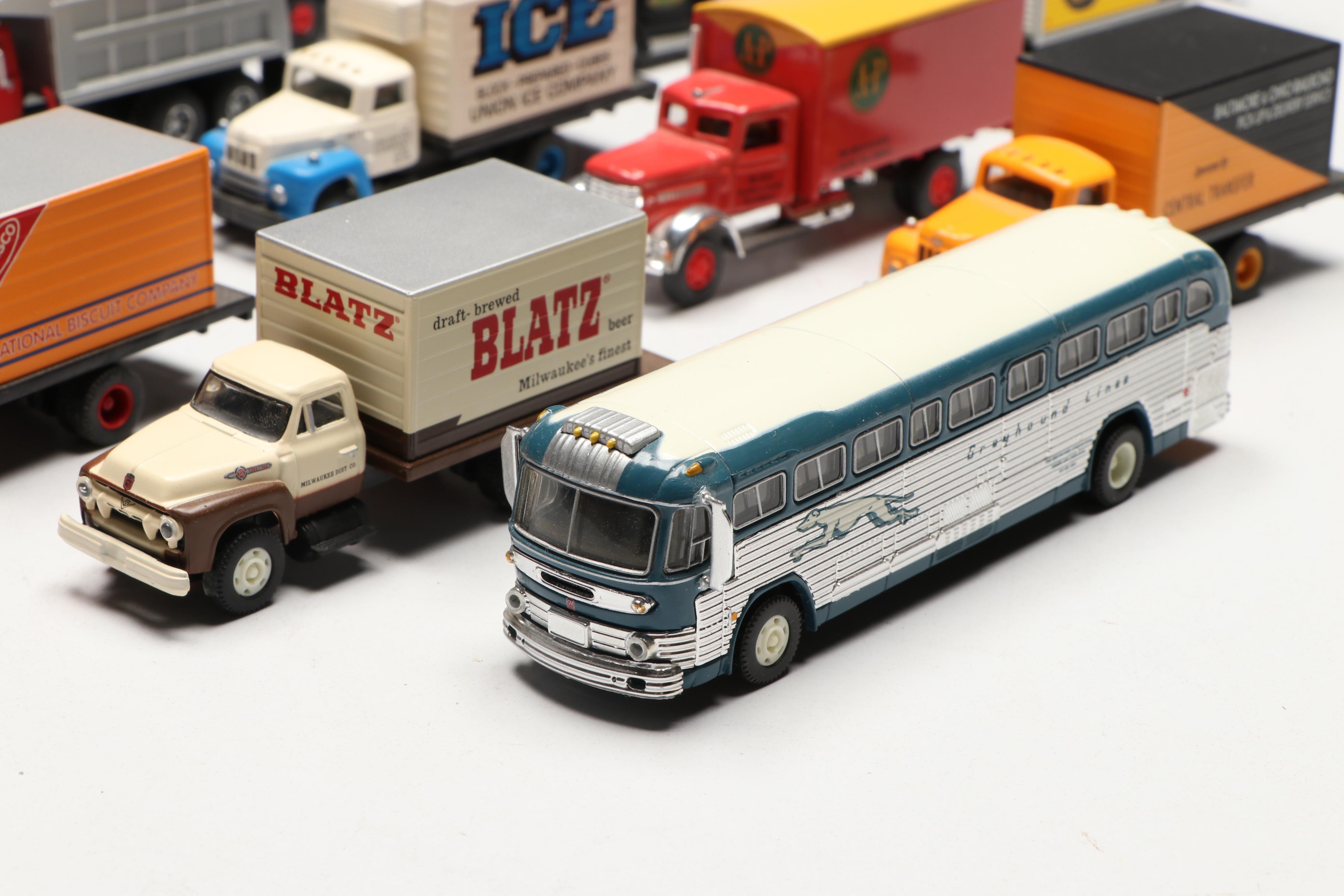 Golden, CMW with Other Train Prop Trucks and Bus