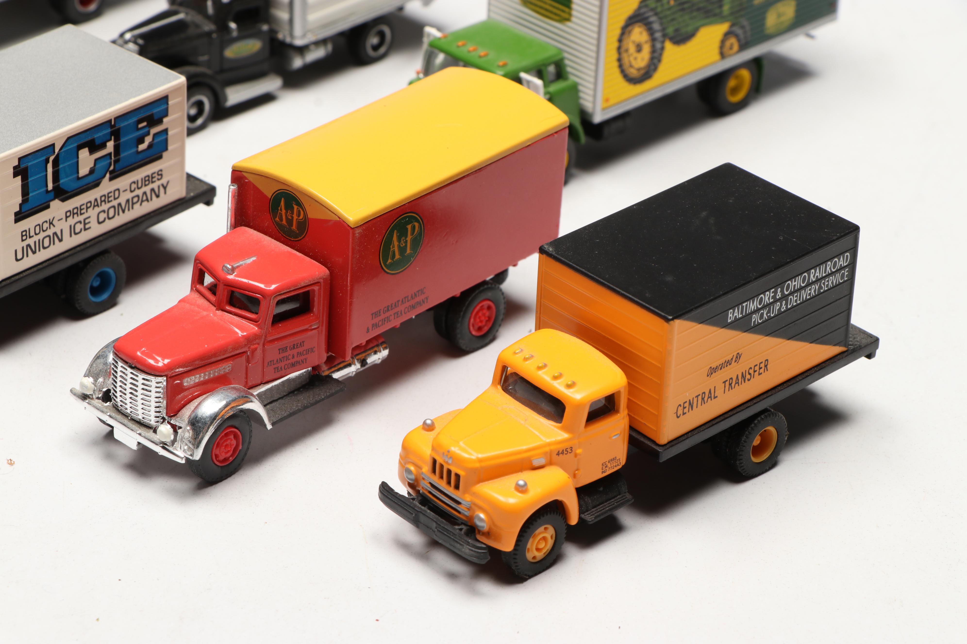 Golden, CMW with Other Train Prop Trucks and Bus