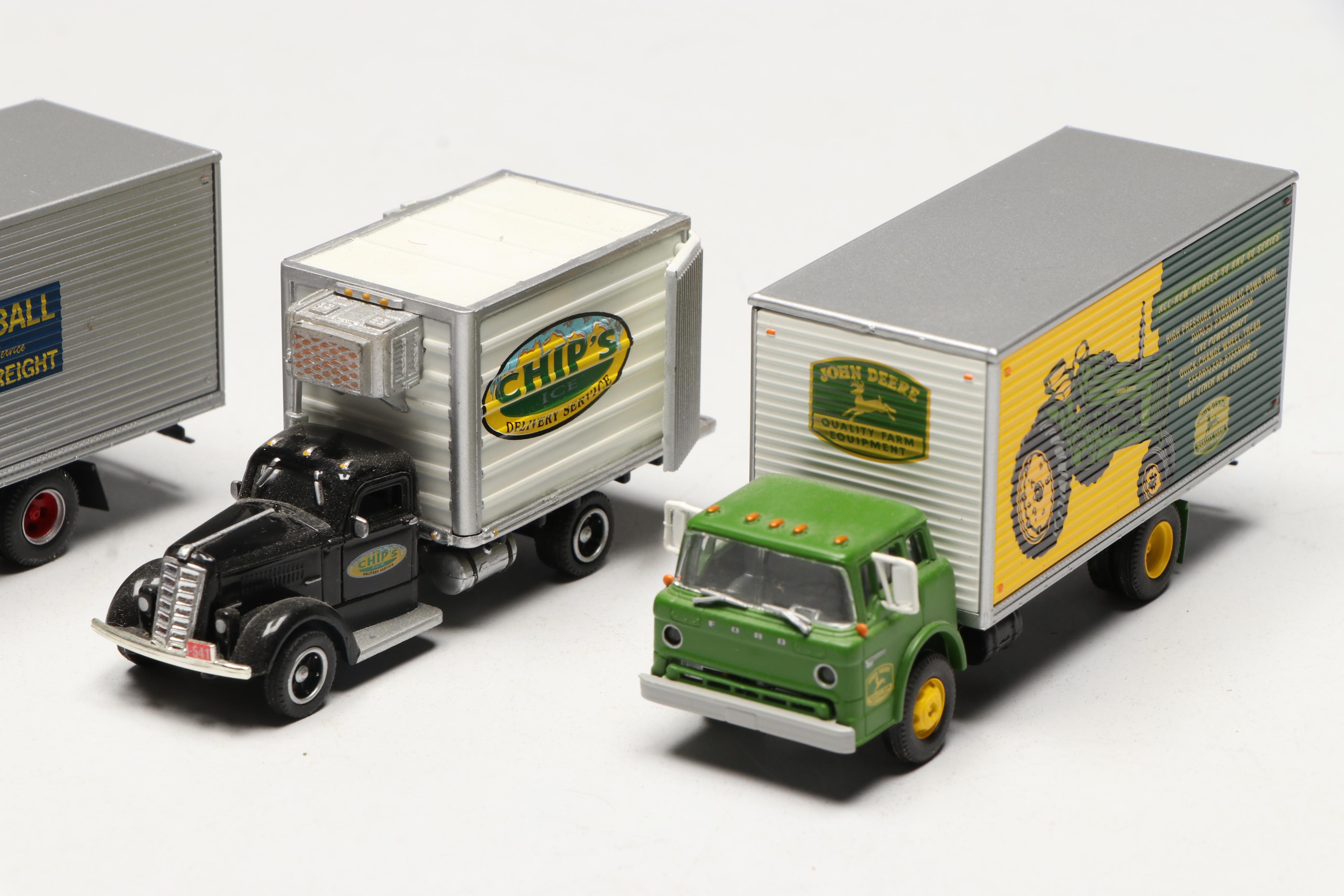 Golden, CMW with Other Train Prop Trucks and Bus