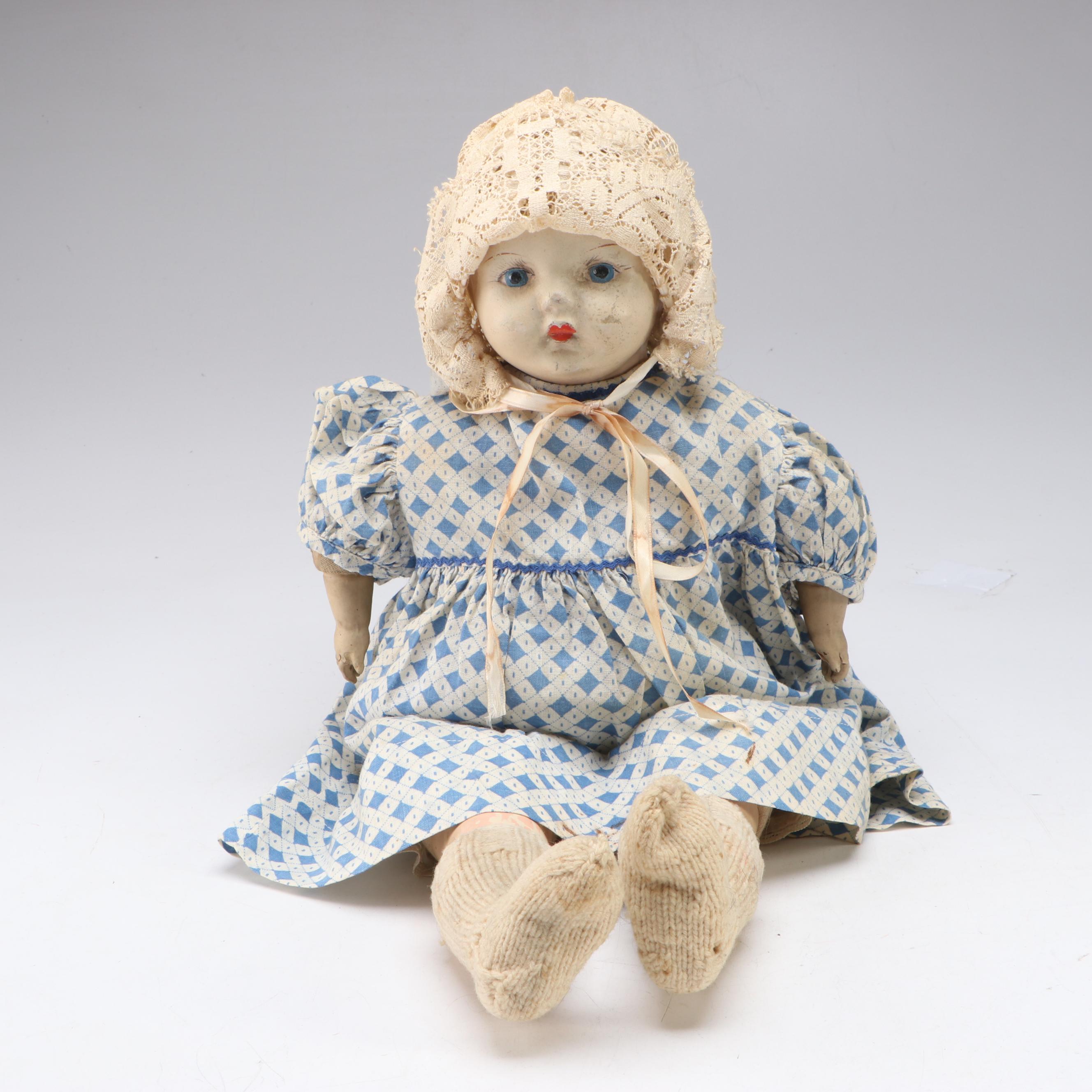 Papier-Mâché and Composition Doll with Cherub Accented Framed Wall Mirror