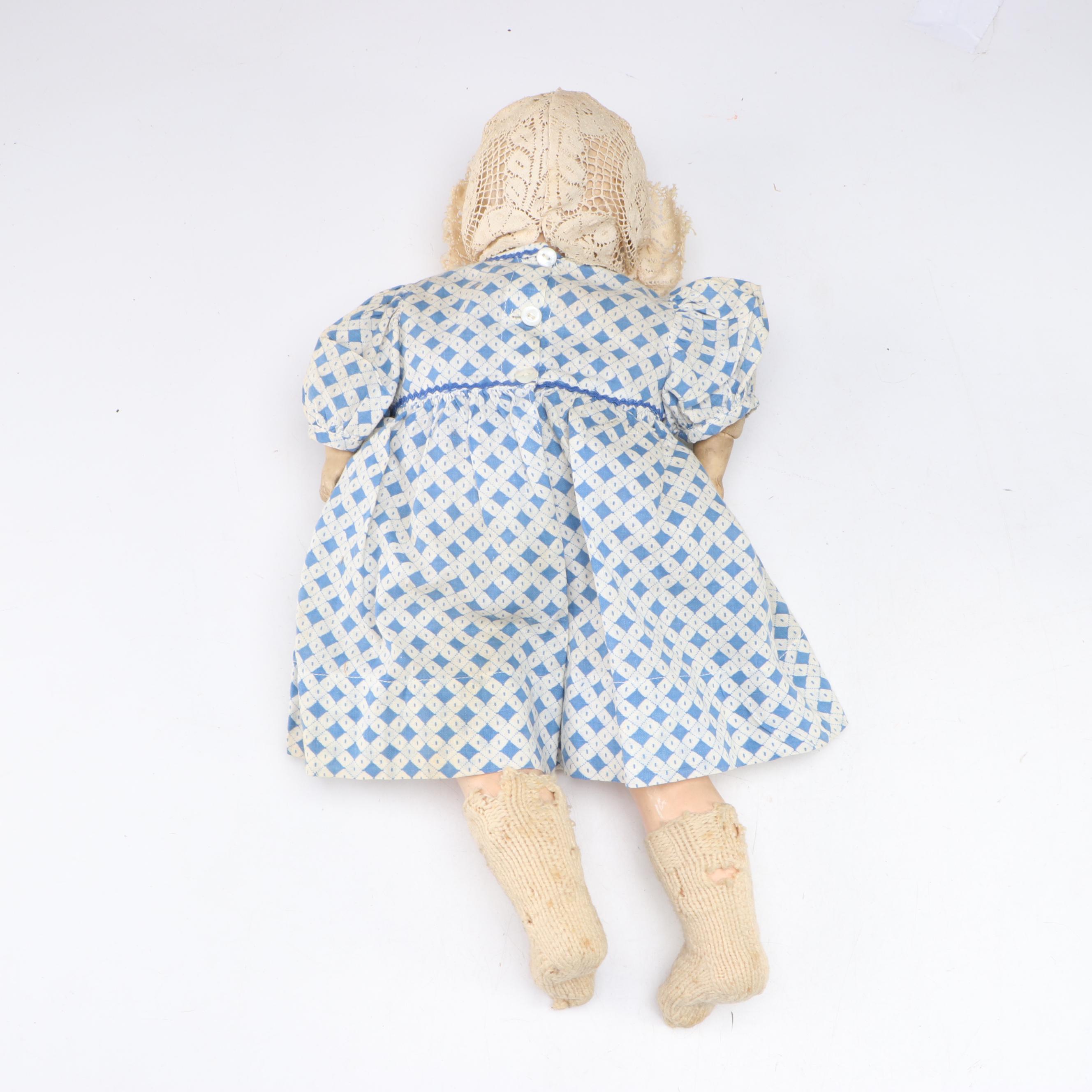 Papier-Mâché and Composition Doll with Cherub Accented Framed Wall Mirror