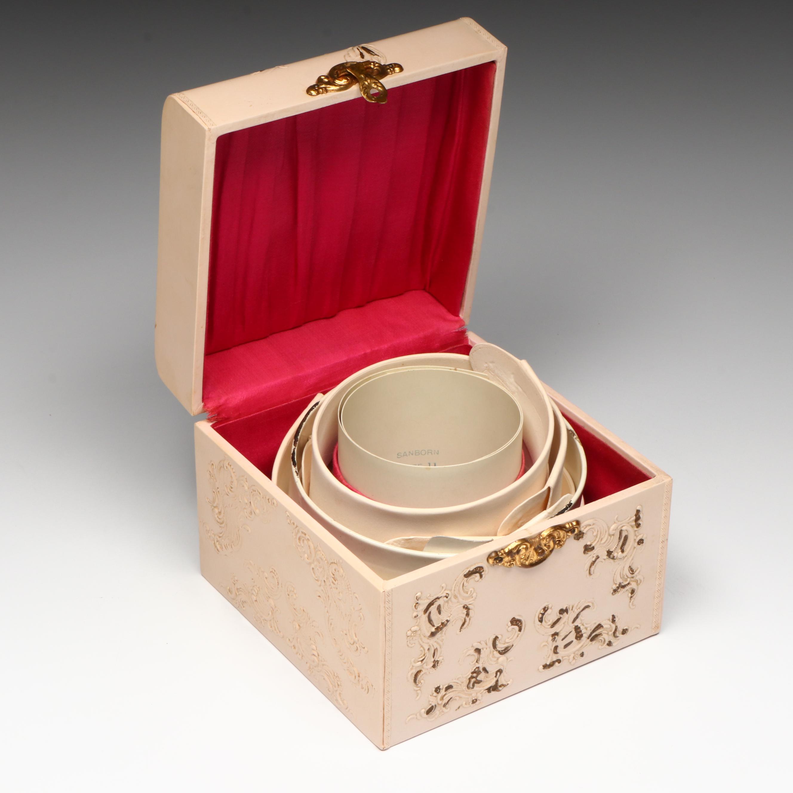 Embossed Pink Collar Box with an Assortment of Starched Collars