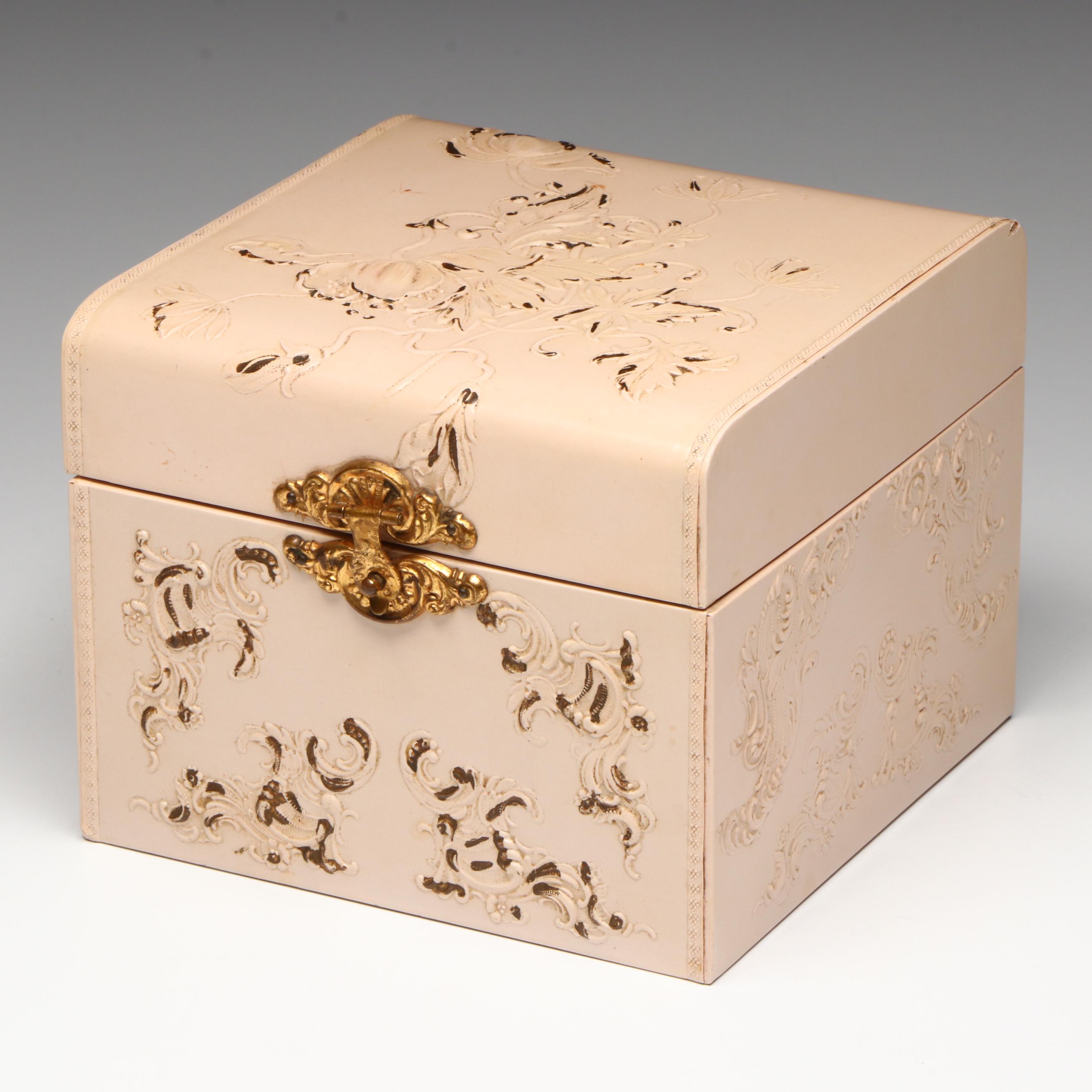 Embossed Pink Collar Box with an Assortment of Starched Collars