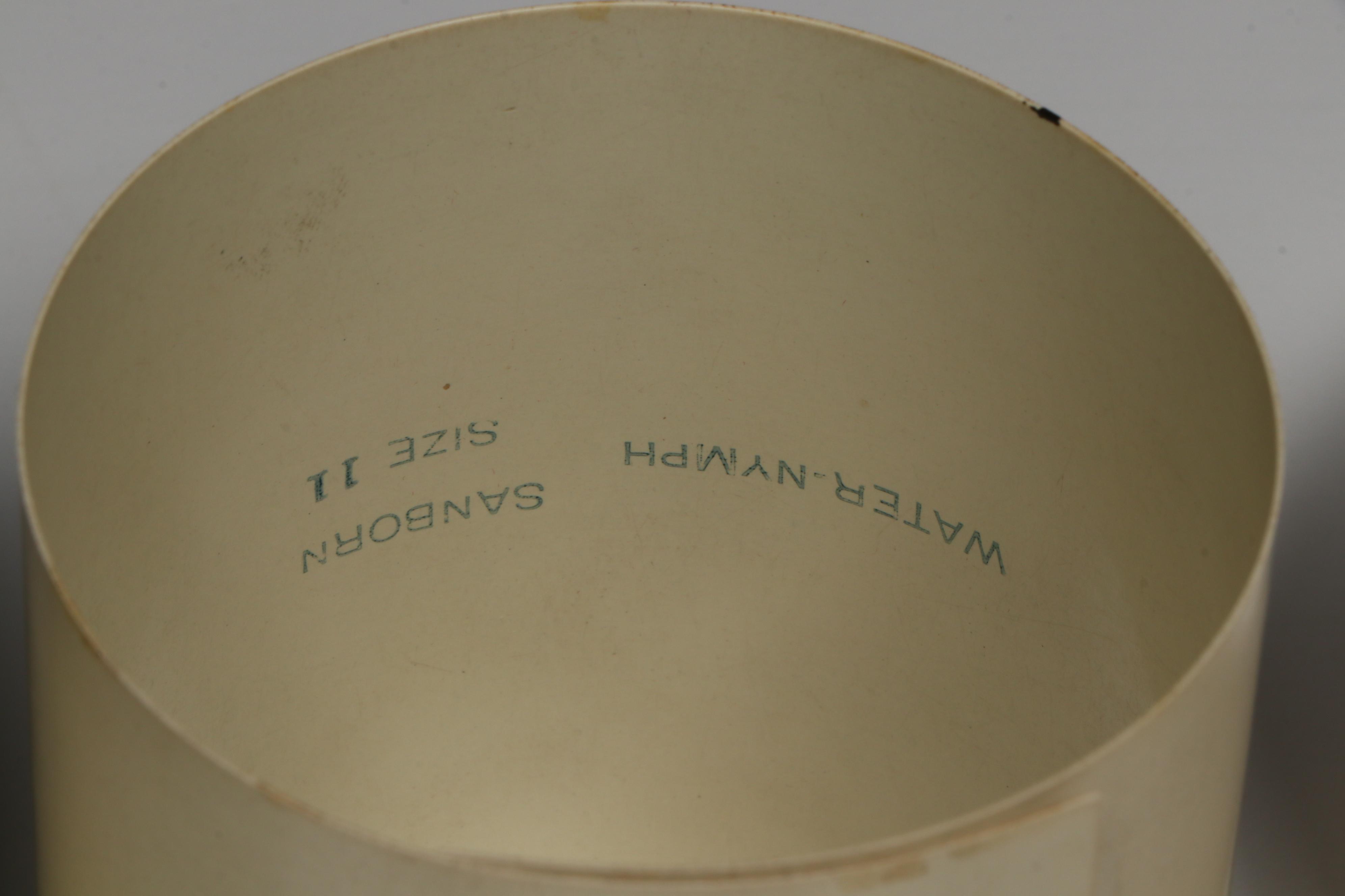 Embossed Pink Collar Box with an Assortment of Starched Collars