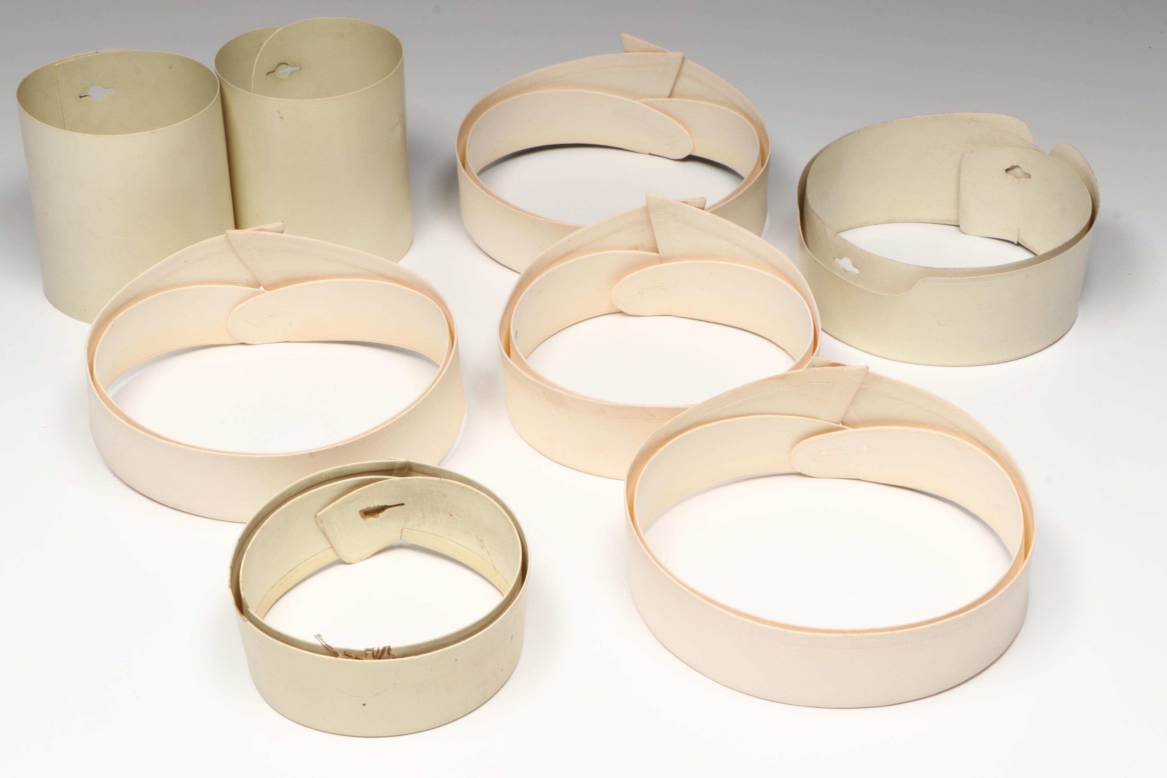 Embossed Pink Collar Box with an Assortment of Starched Collars