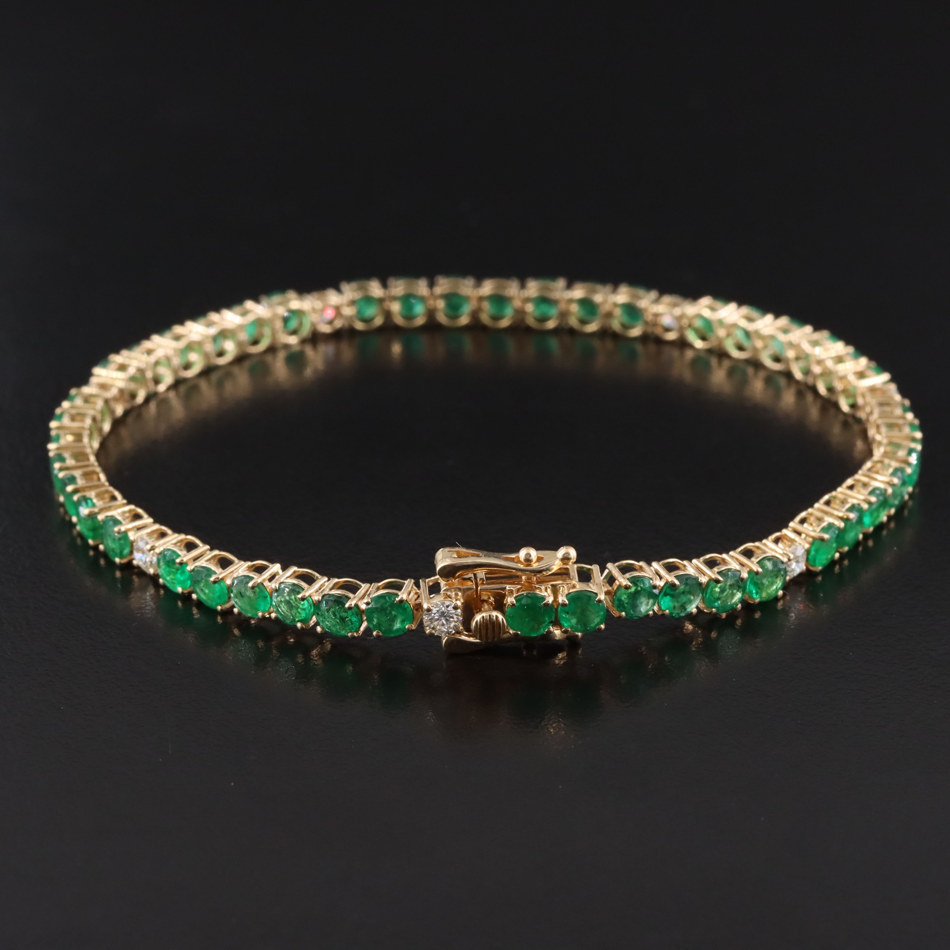 18K 6.81 CTW Emerald and Diamond Bracelet