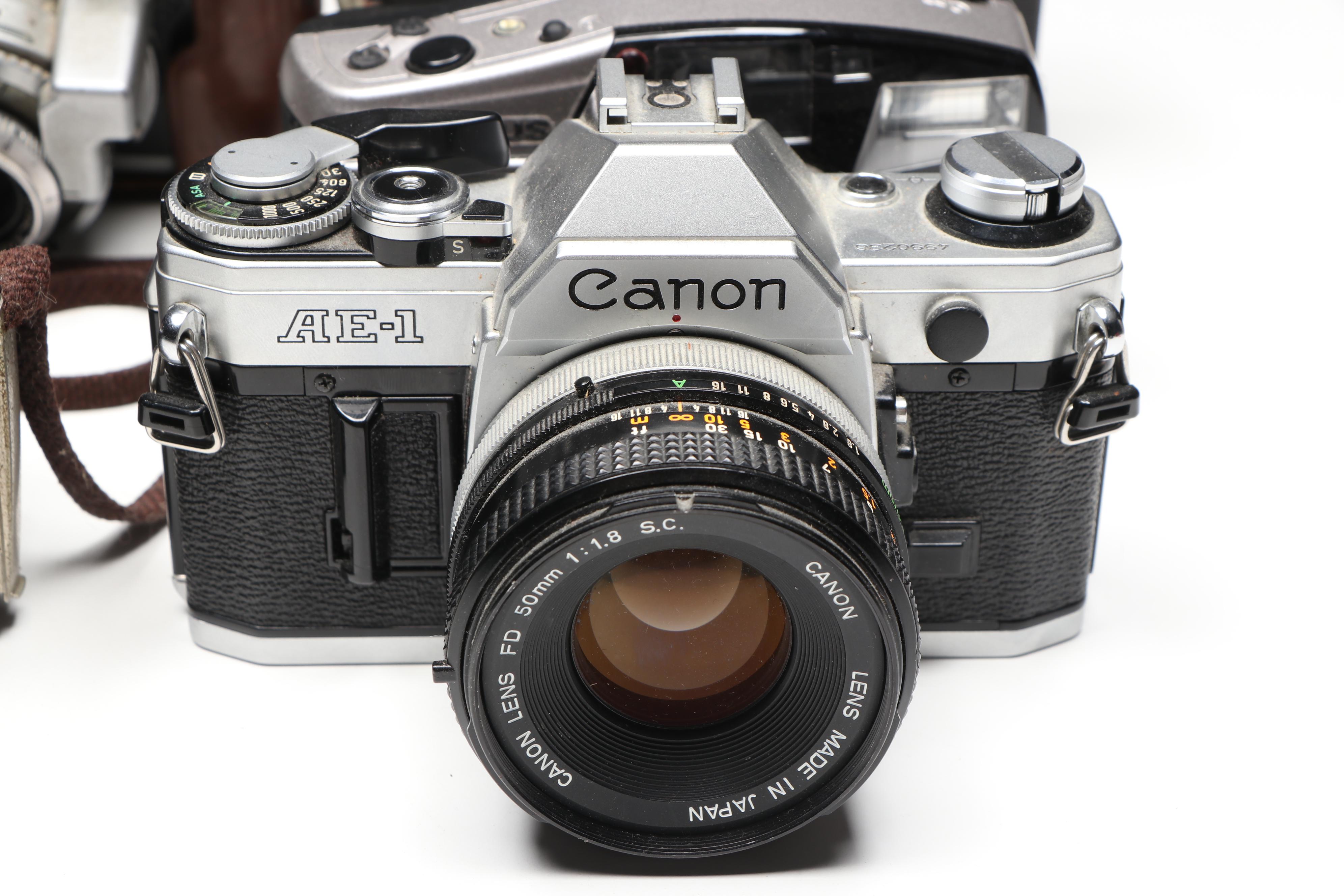 Kodak Pocket, Canon AE-1, Minolta X-570, and More SLR, Box, and Movie Cameras