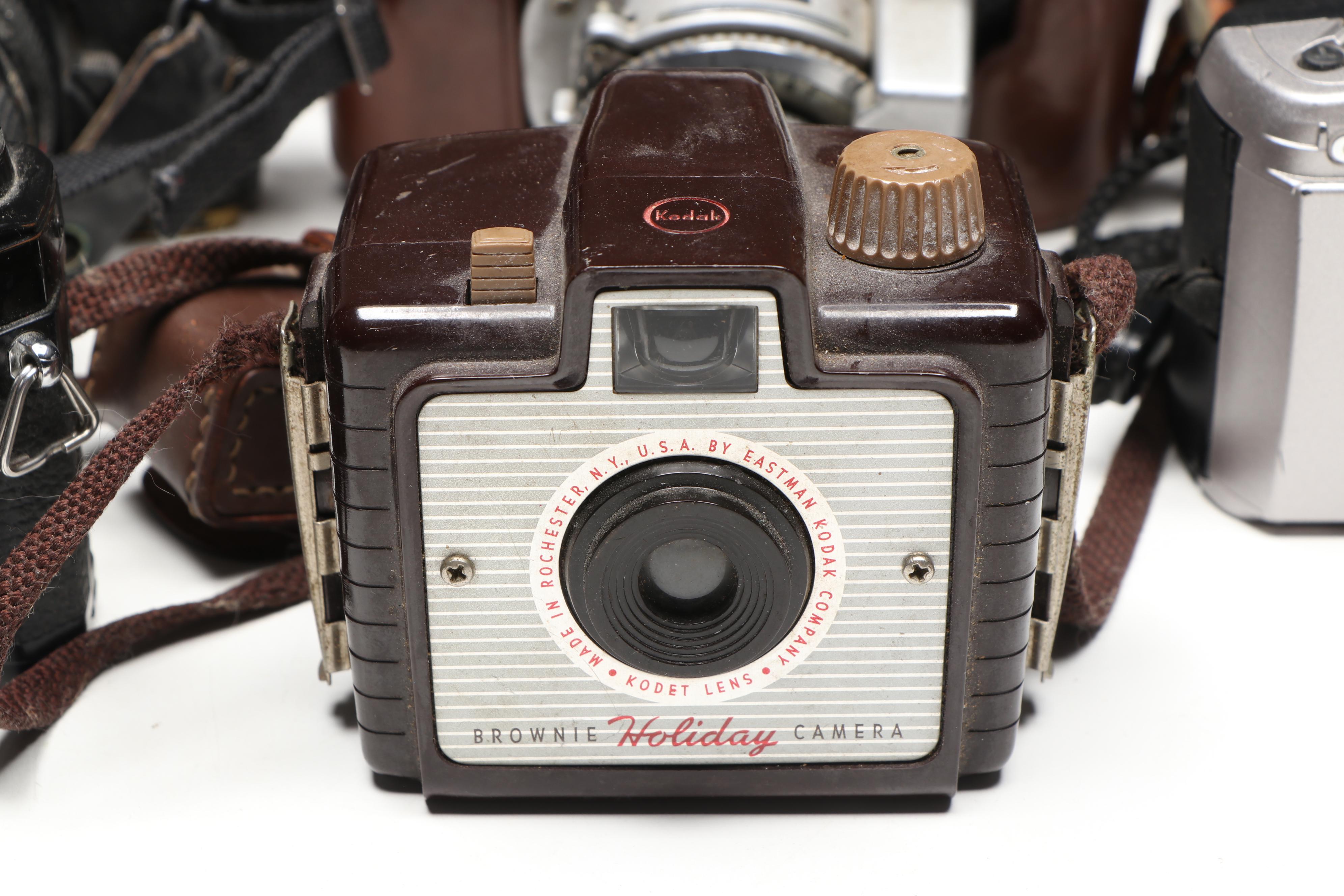 Kodak Pocket, Canon AE-1, Minolta X-570, and More SLR, Box, and Movie Cameras