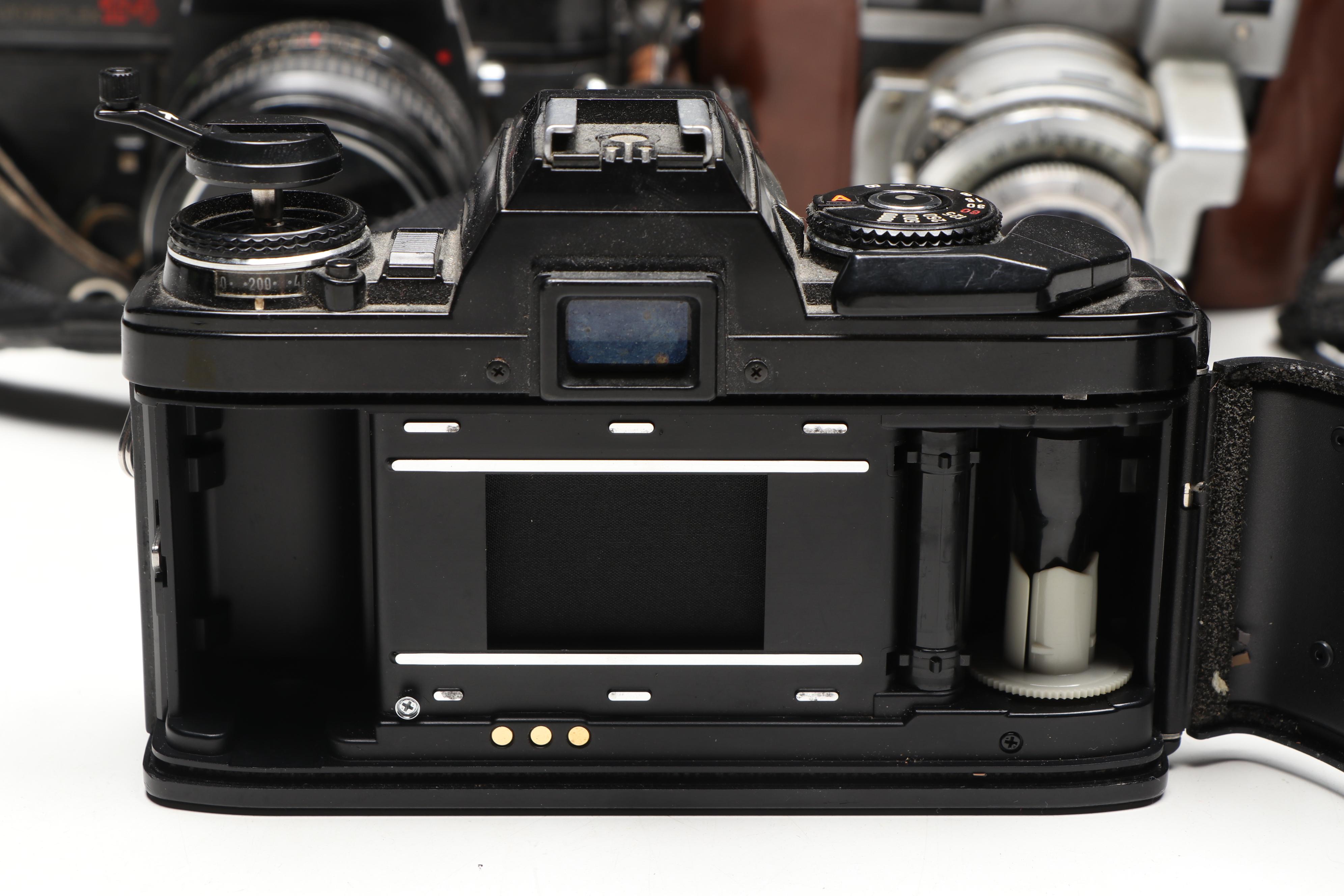 Kodak Pocket, Canon AE-1, Minolta X-570, and More SLR, Box, and Movie Cameras