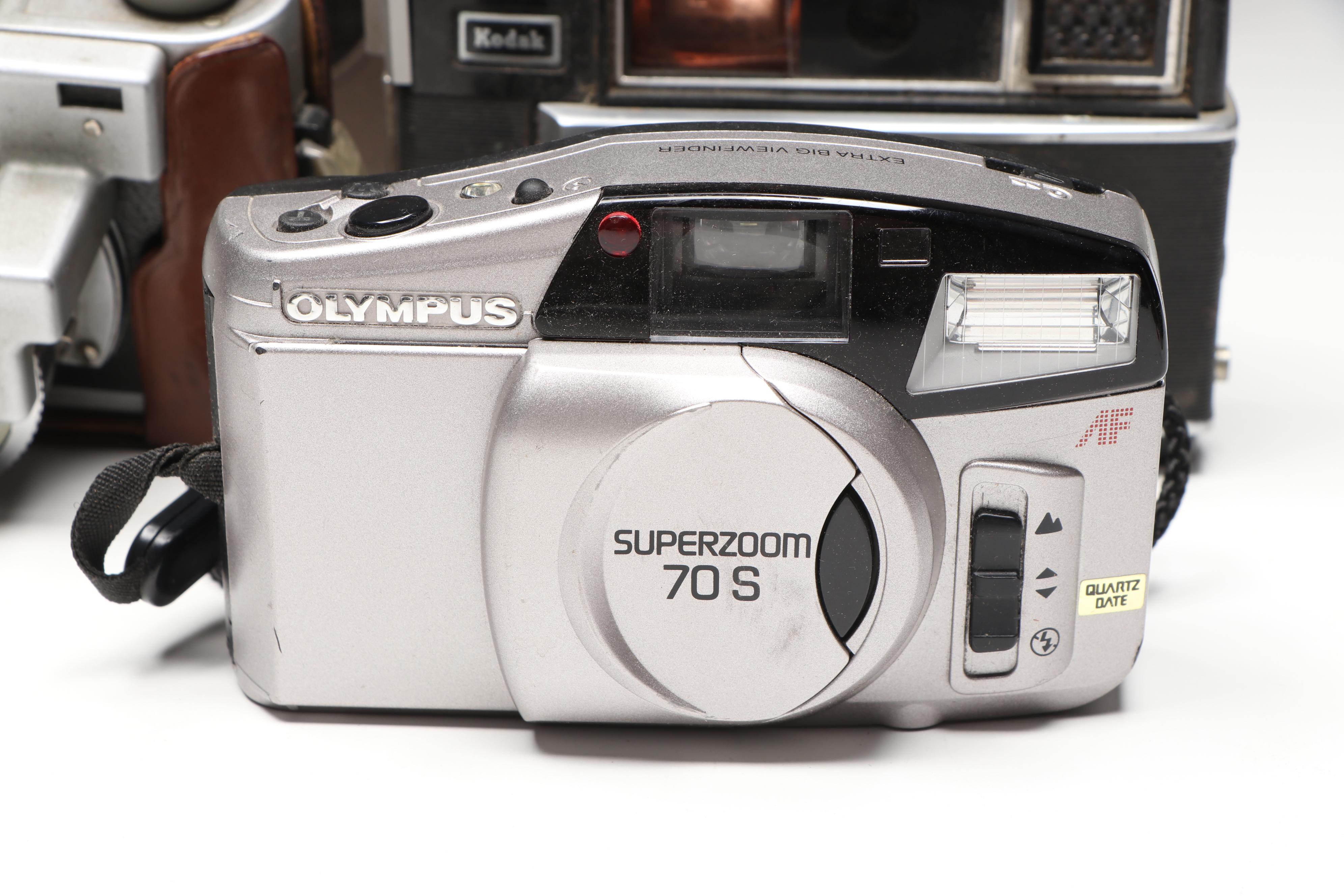 Kodak Pocket, Canon AE-1, Minolta X-570, and More SLR, Box, and Movie Cameras