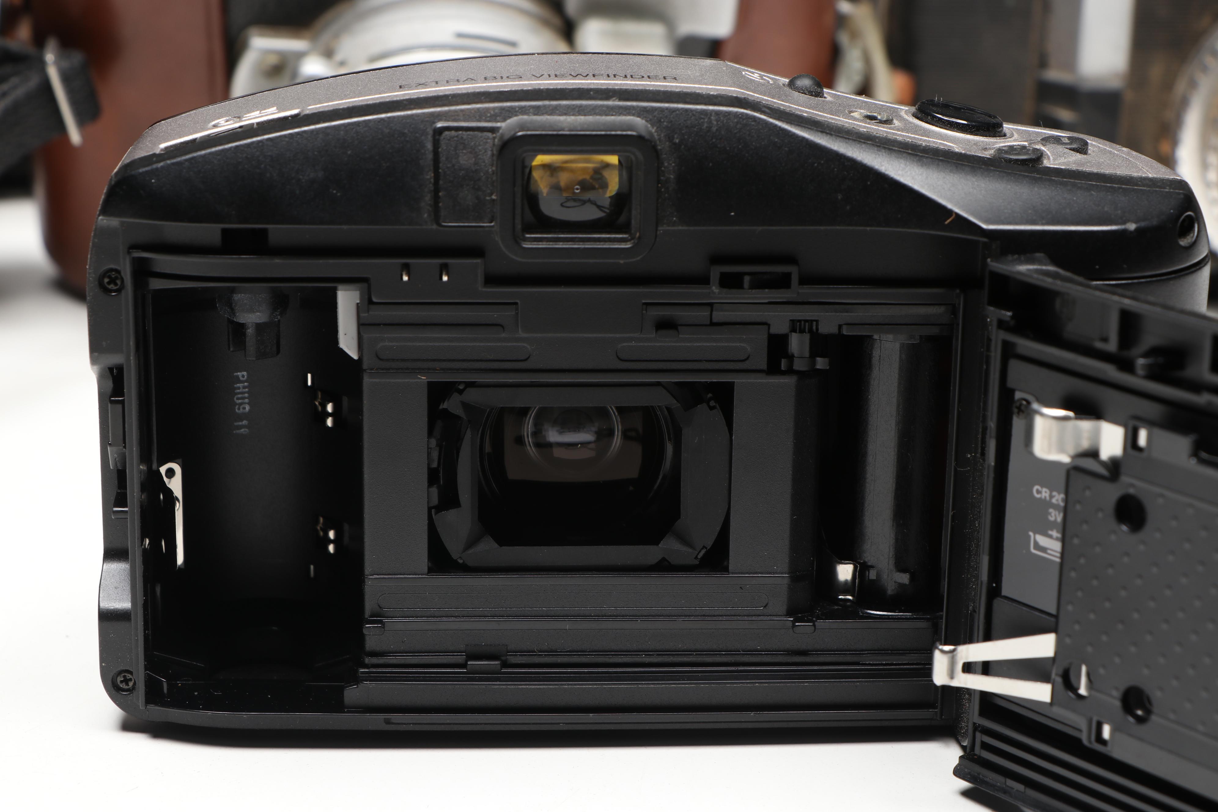 Kodak Pocket, Canon AE-1, Minolta X-570, and More SLR, Box, and Movie Cameras