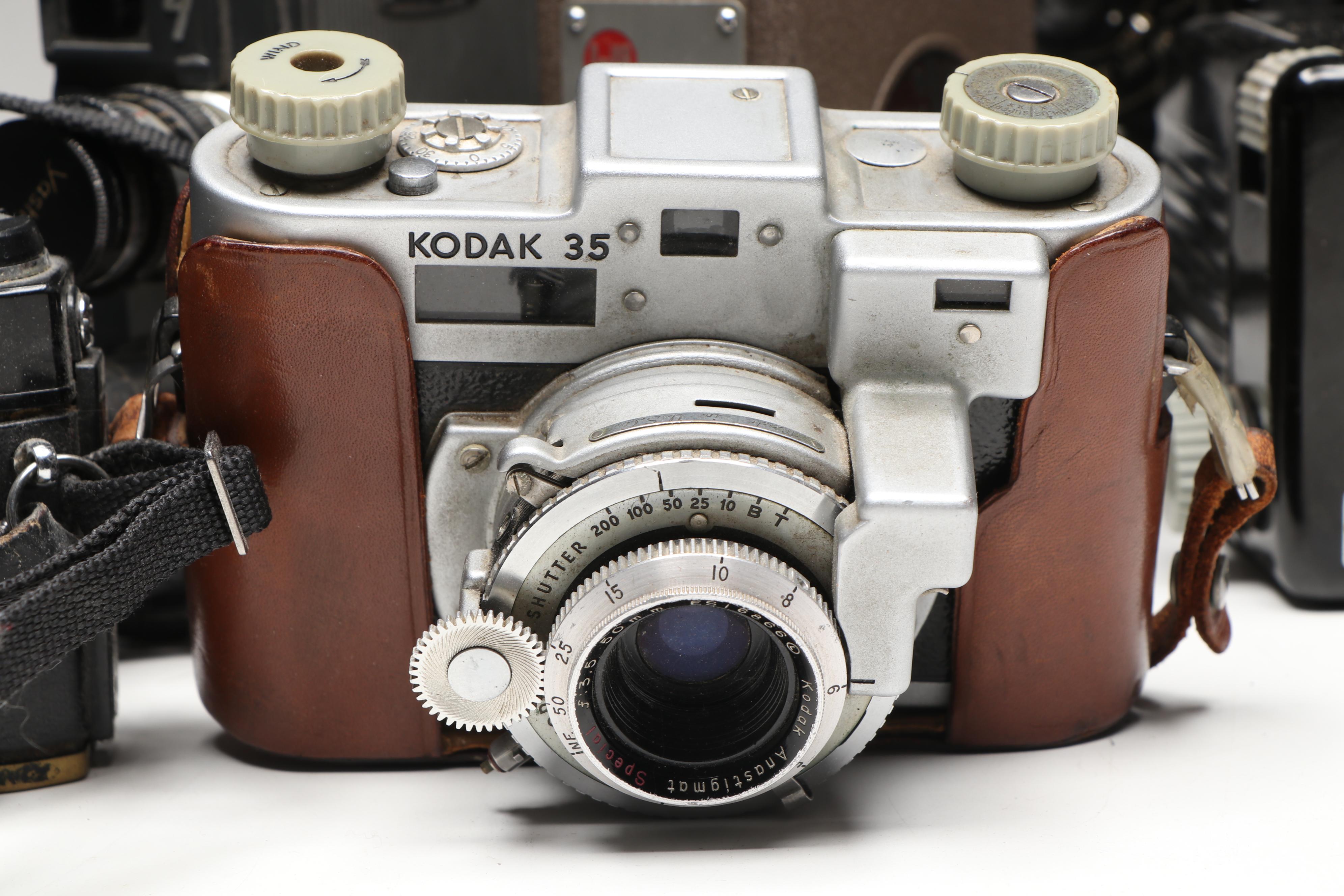 Kodak Pocket, Canon AE-1, Minolta X-570, and More SLR, Box, and Movie Cameras
