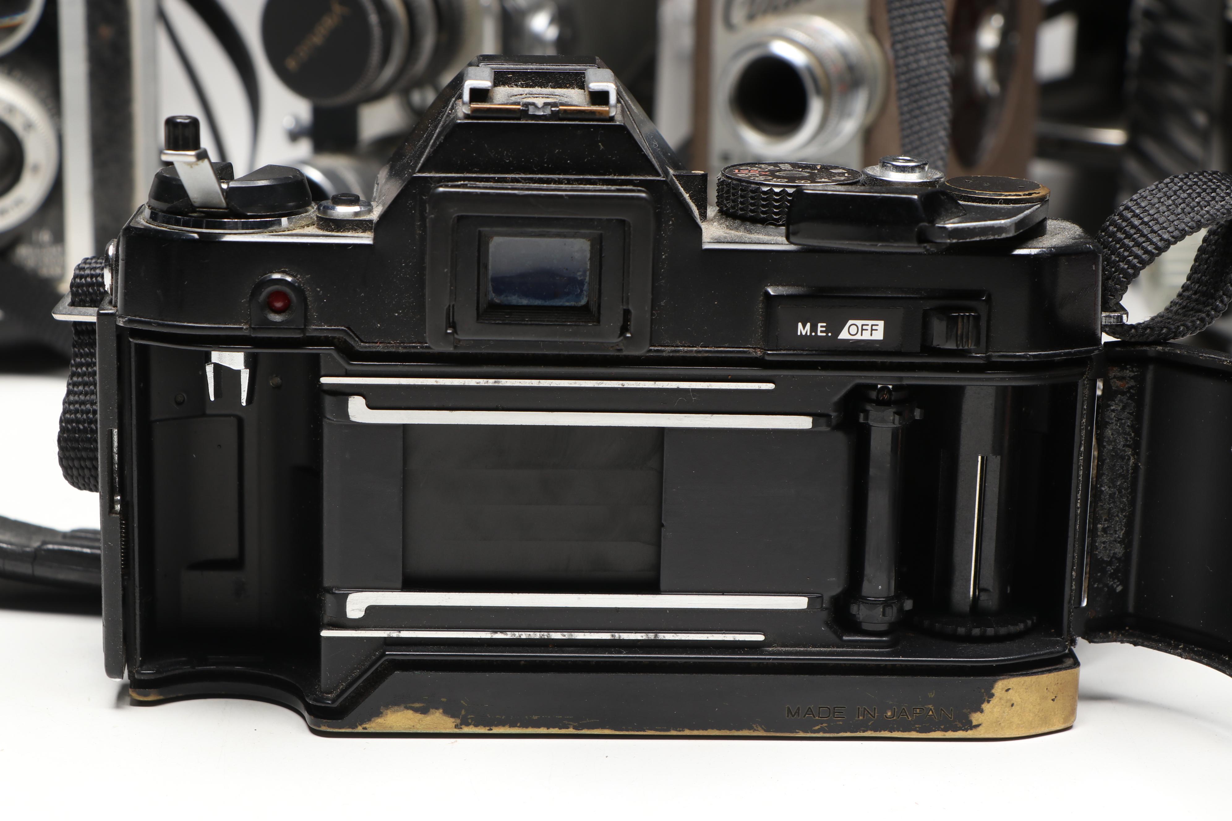 Kodak Pocket, Canon AE-1, Minolta X-570, and More SLR, Box, and Movie Cameras