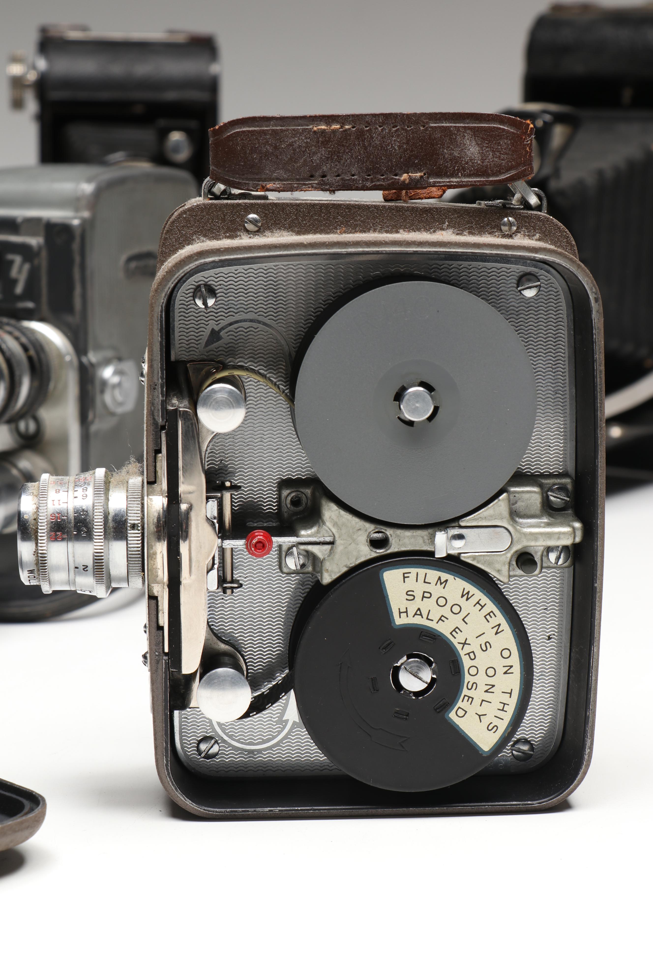 Kodak Pocket, Canon AE-1, Minolta X-570, and More SLR, Box, and Movie Cameras