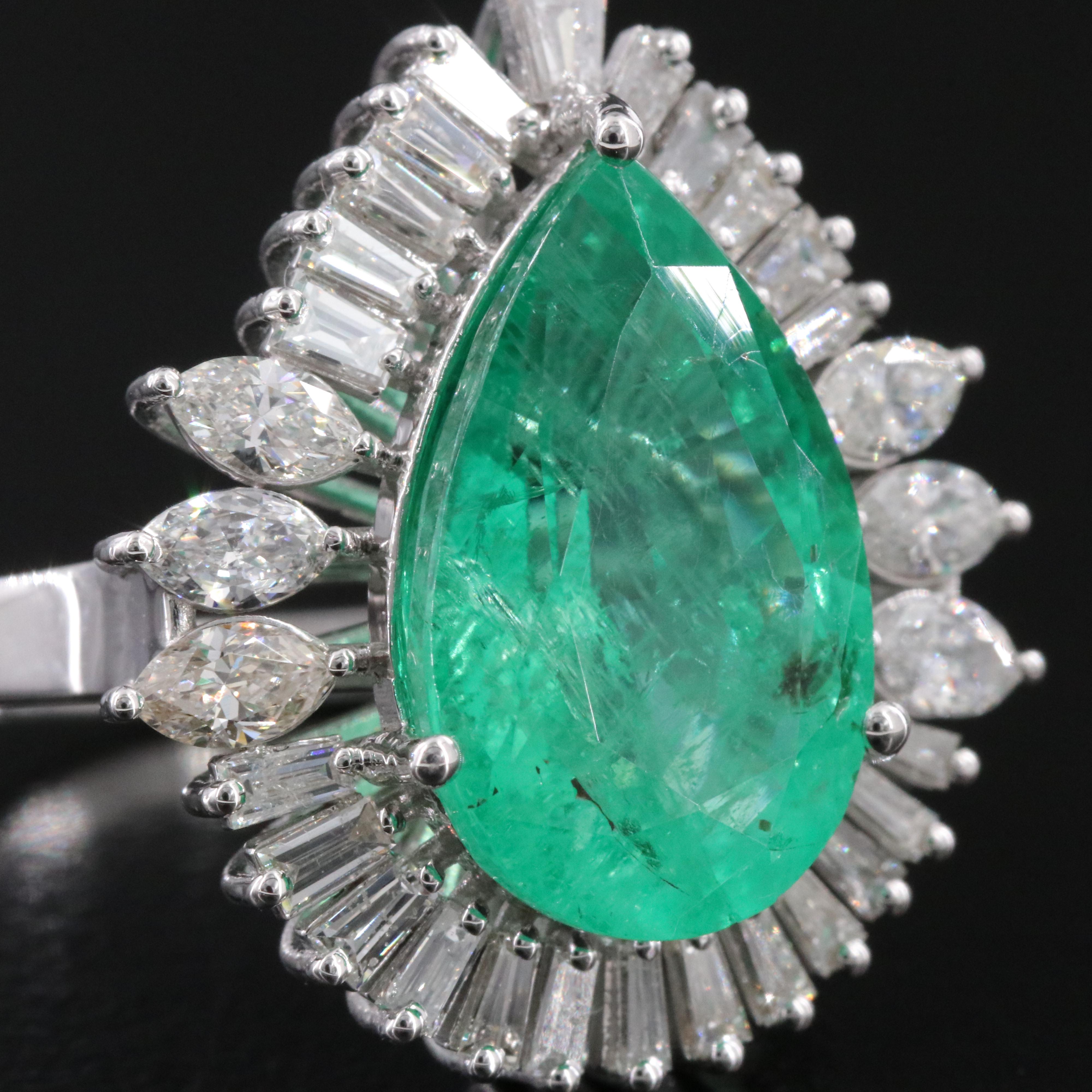 18K 5.17 CT Emerald and 1.05 CTW Diamond Ring
