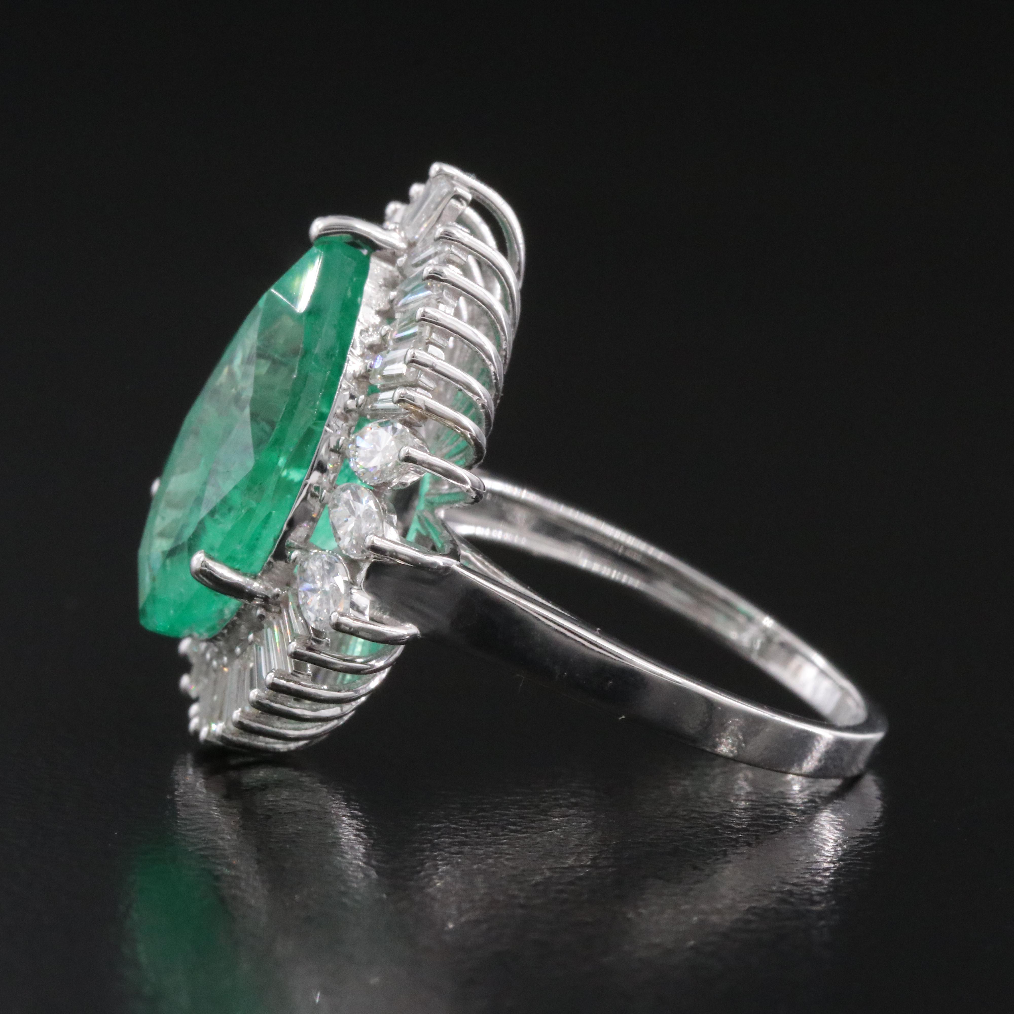 18K 5.17 CT Emerald and 1.05 CTW Diamond Ring