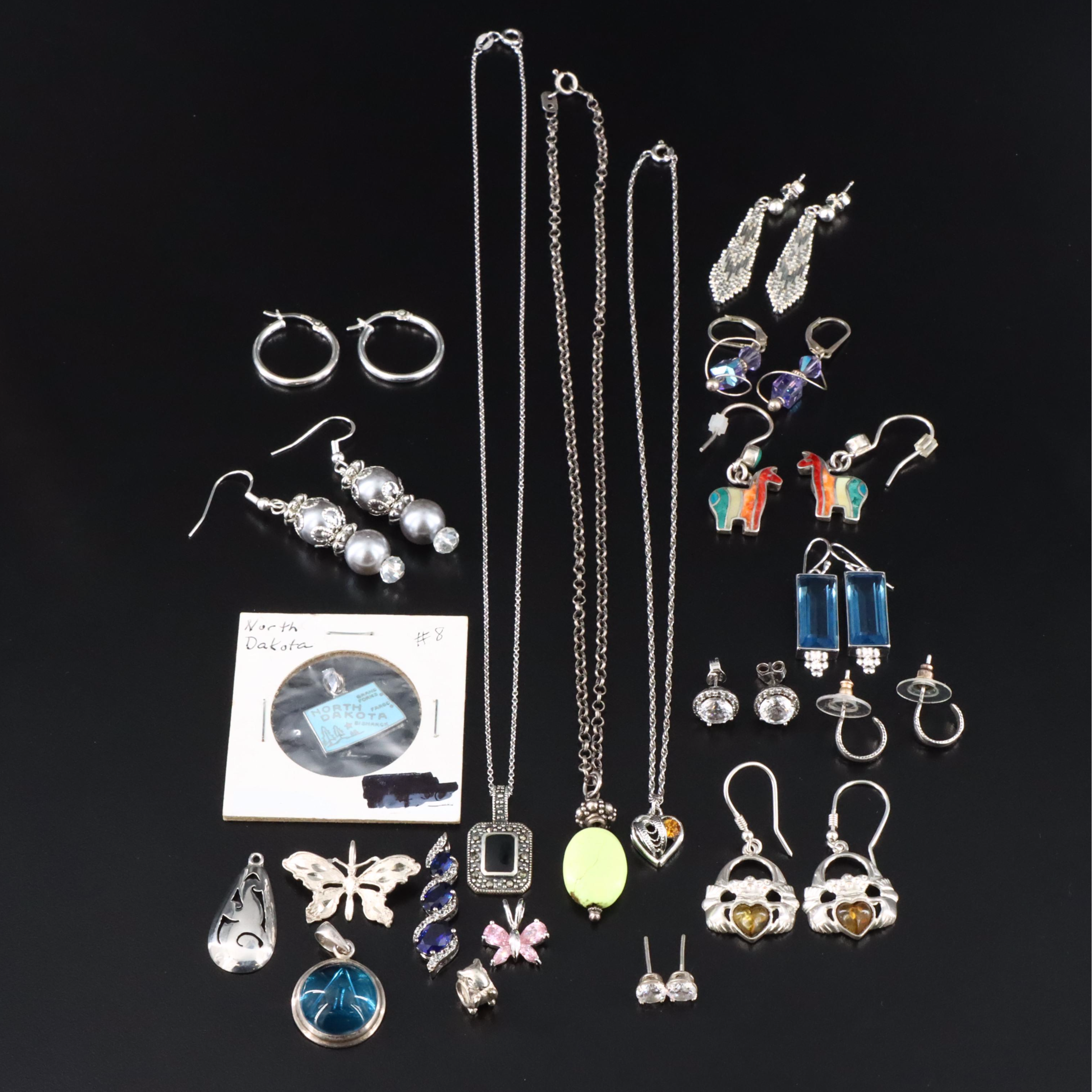 Assorted Sterling Jewelry with Amber, Black Onyx, and CZ