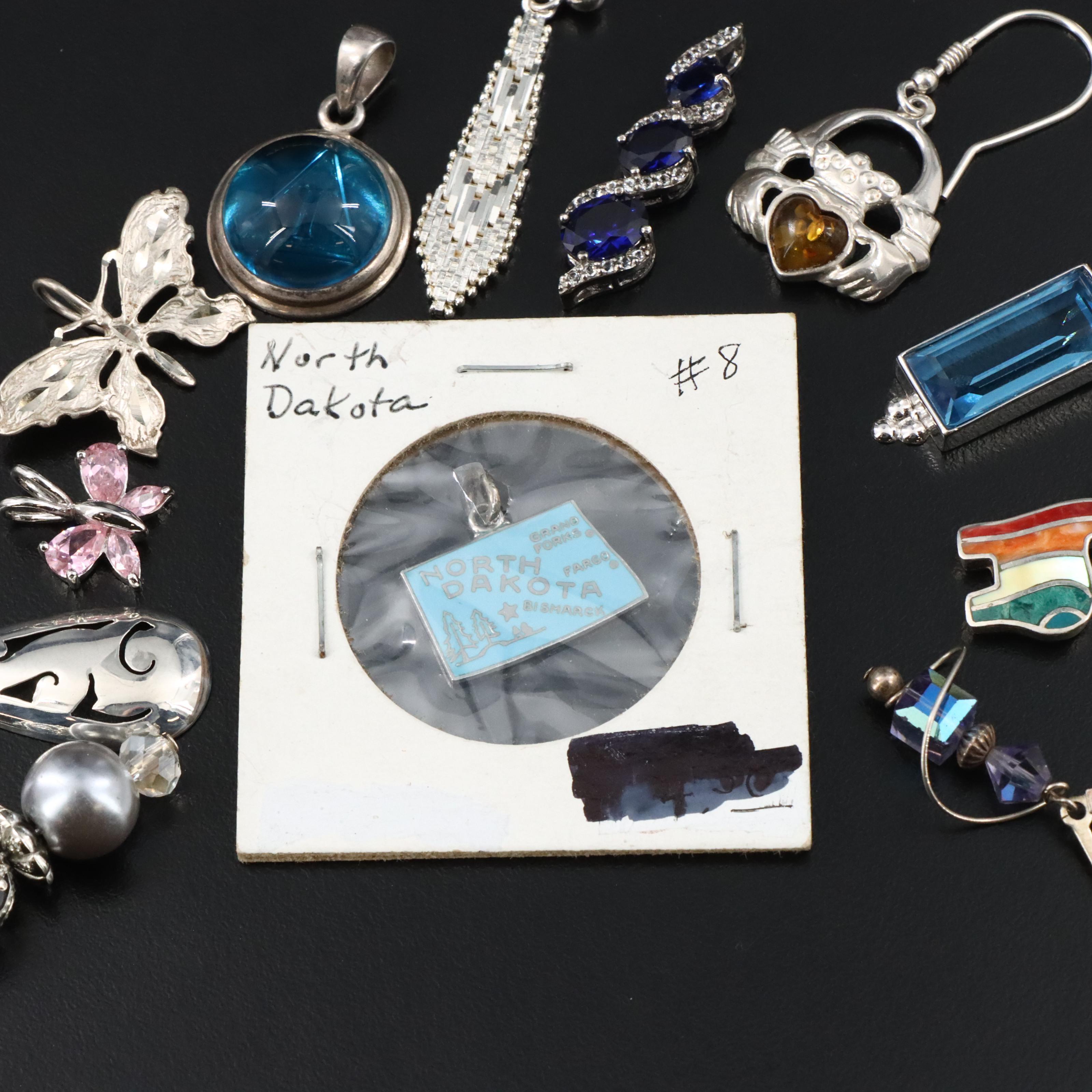 Assorted Sterling Jewelry with Amber, Black Onyx, and CZ