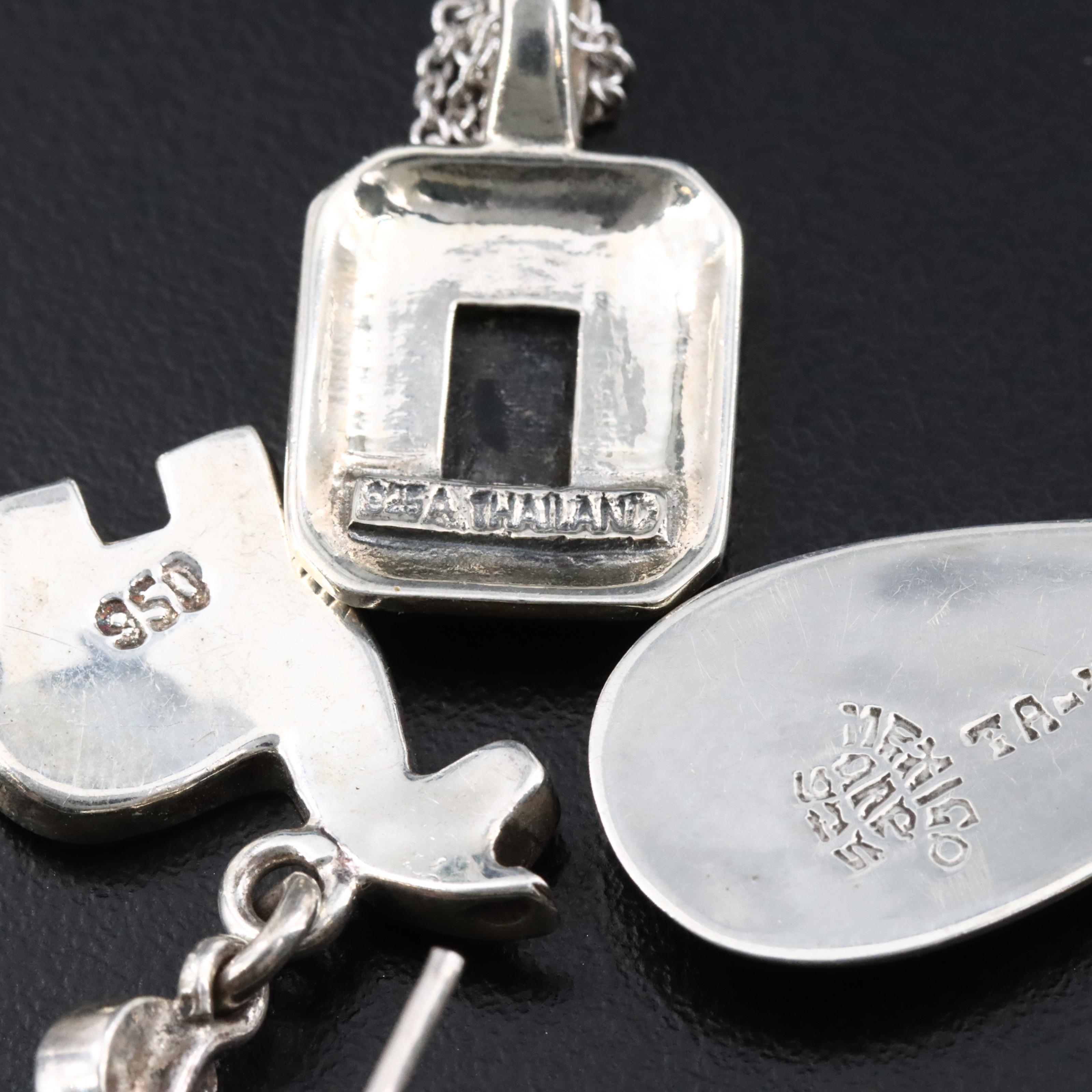 Assorted Sterling Jewelry with Amber, Black Onyx, and CZ