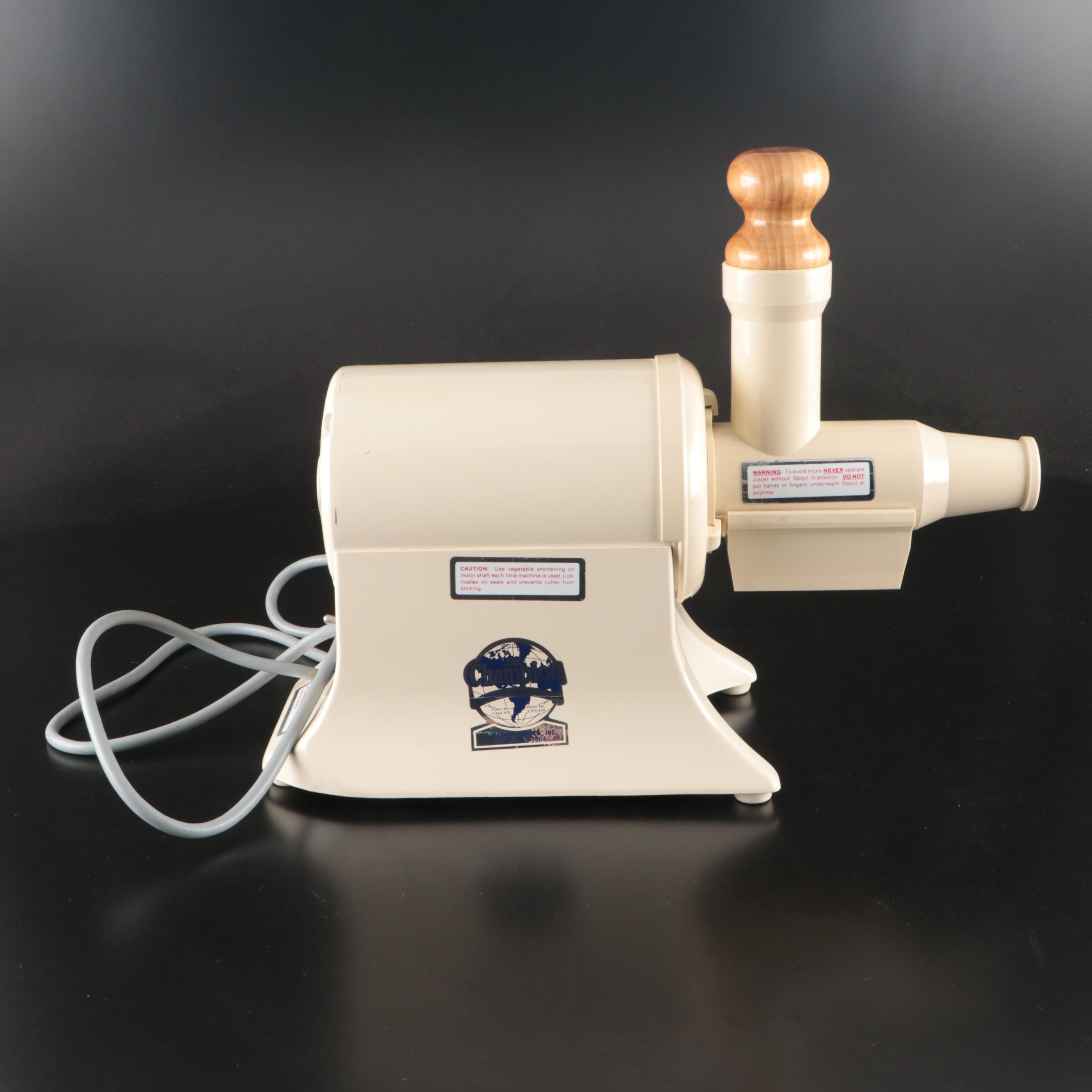 Plastaket Co. Champion Metal Juicer with Attachments and Booklet