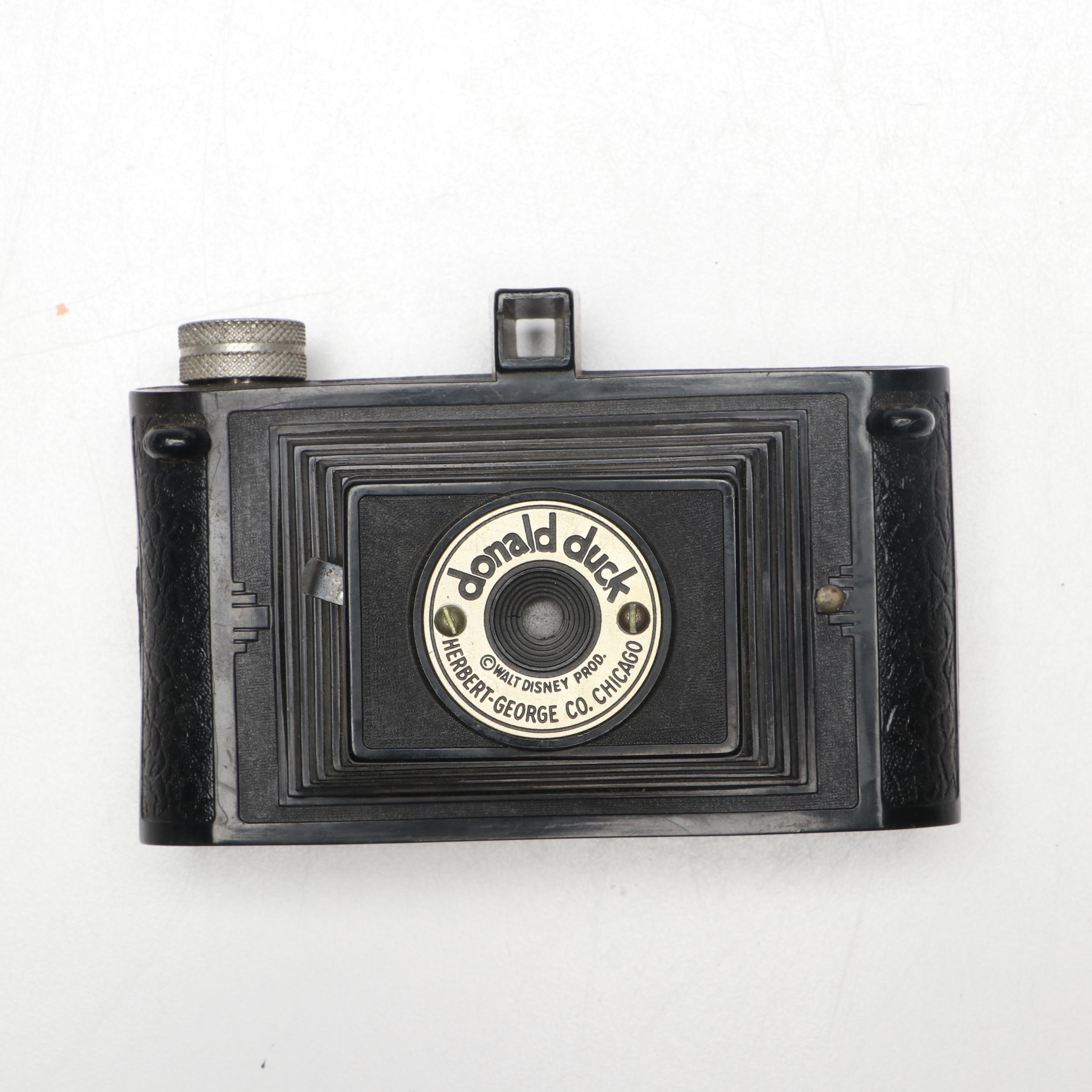 Eastman-Kodak Folding Camera with Herbert-George Co. "Donald Duck" Box Cameras