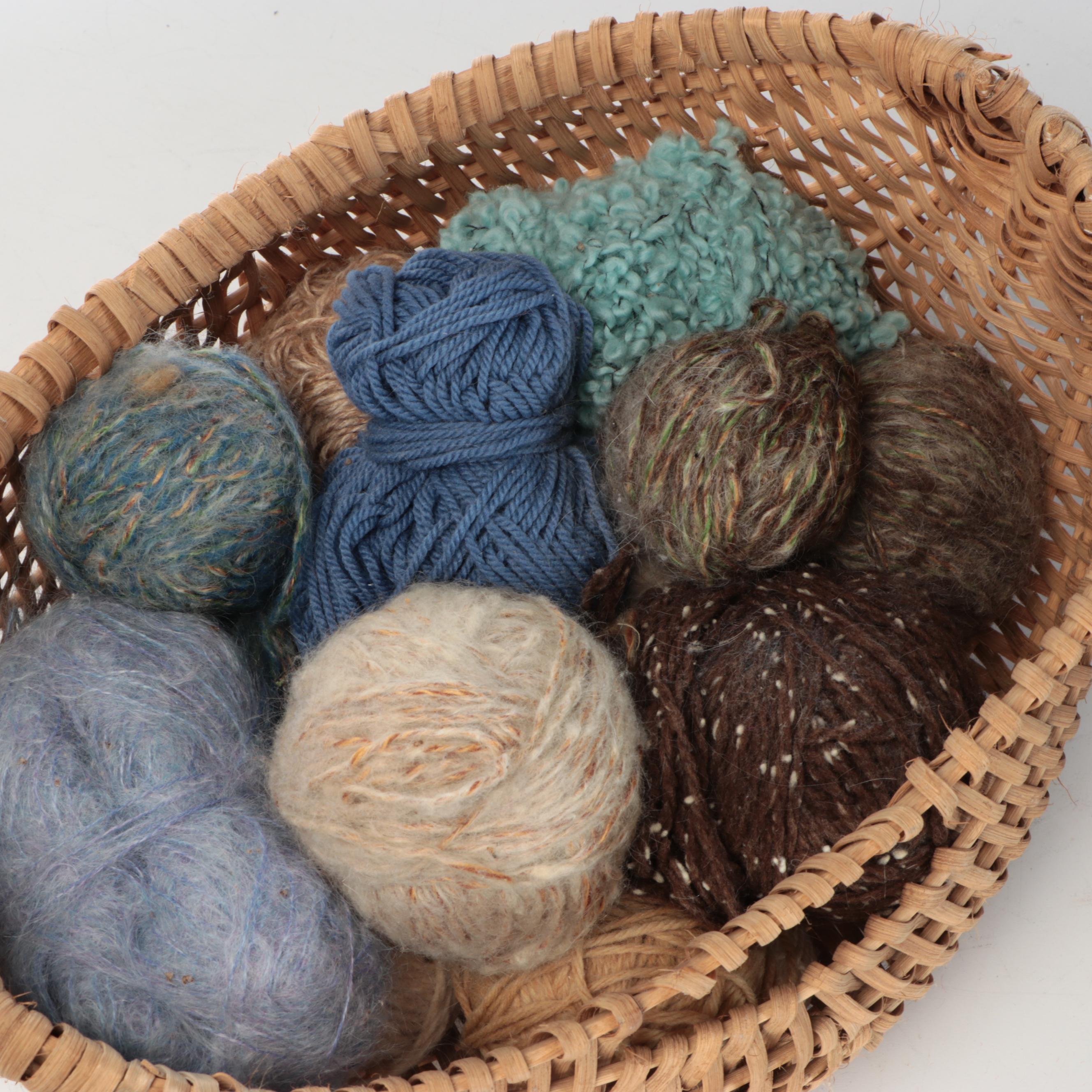 Primitive Style Wooden Spinning Wheel with Baskets and Knitting Supplies