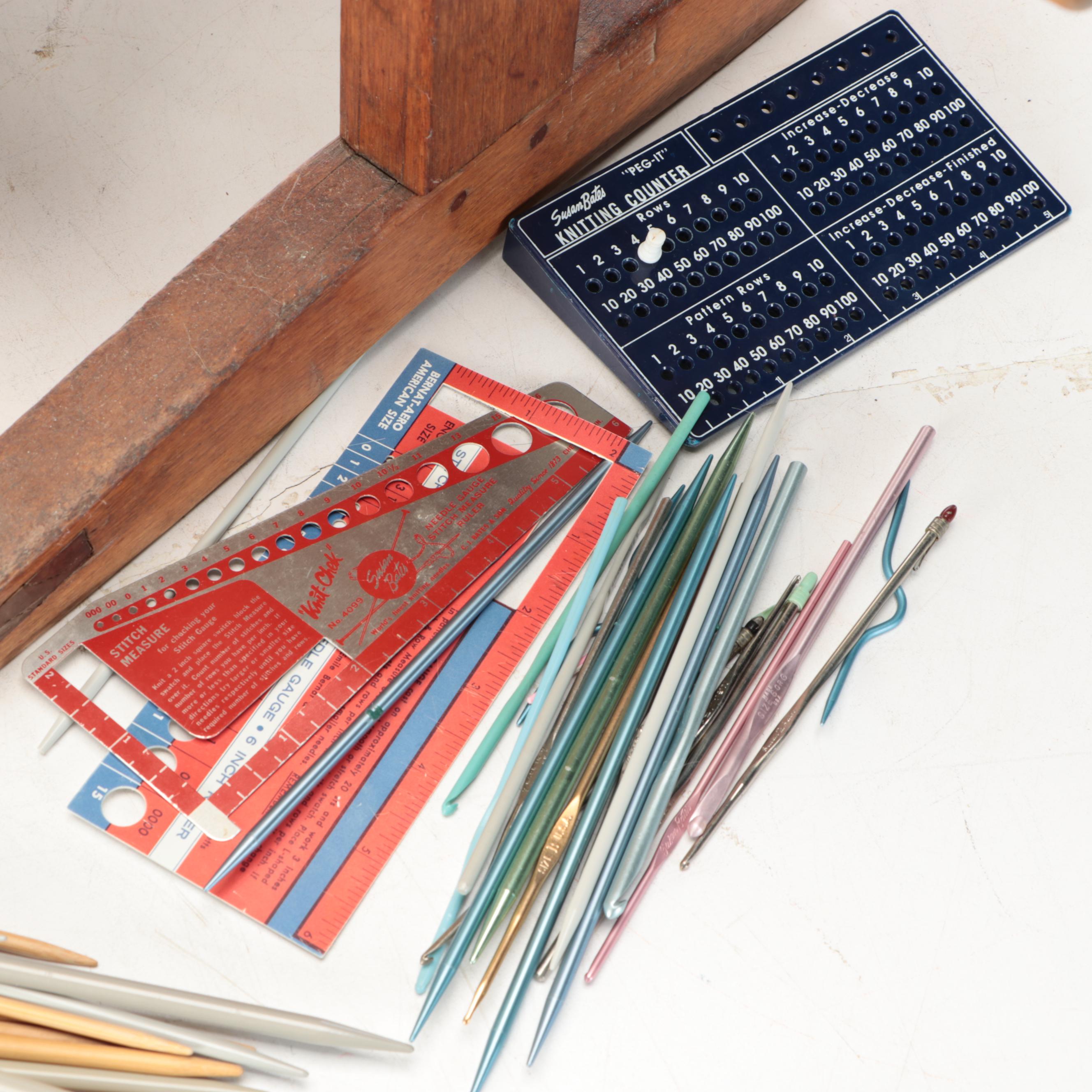 Primitive Style Wooden Spinning Wheel with Baskets and Knitting Supplies