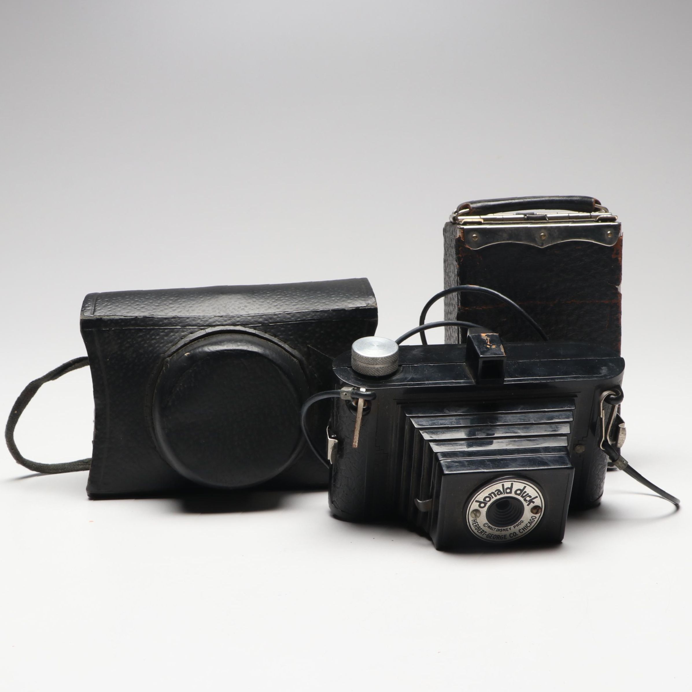 Eastman-Kodak Folding Camera with Herbert-George Co. "Donald Duck" Box Cameras