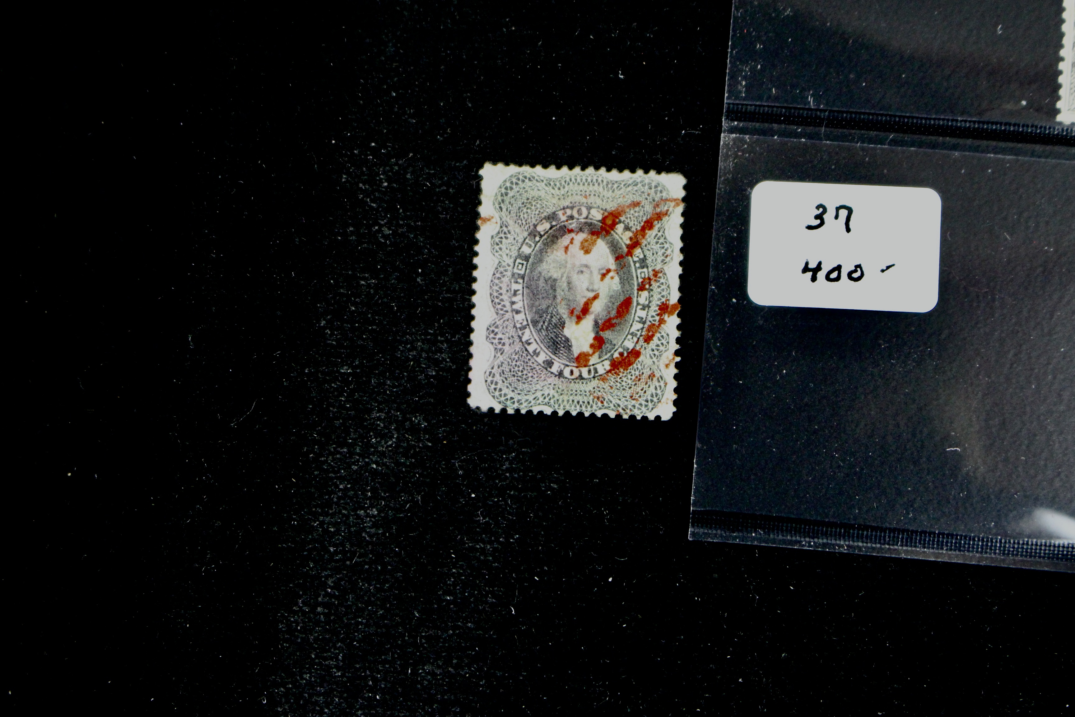 Four Early U.S. Postage Stamps, Scott 36, 36b, 37, and 38