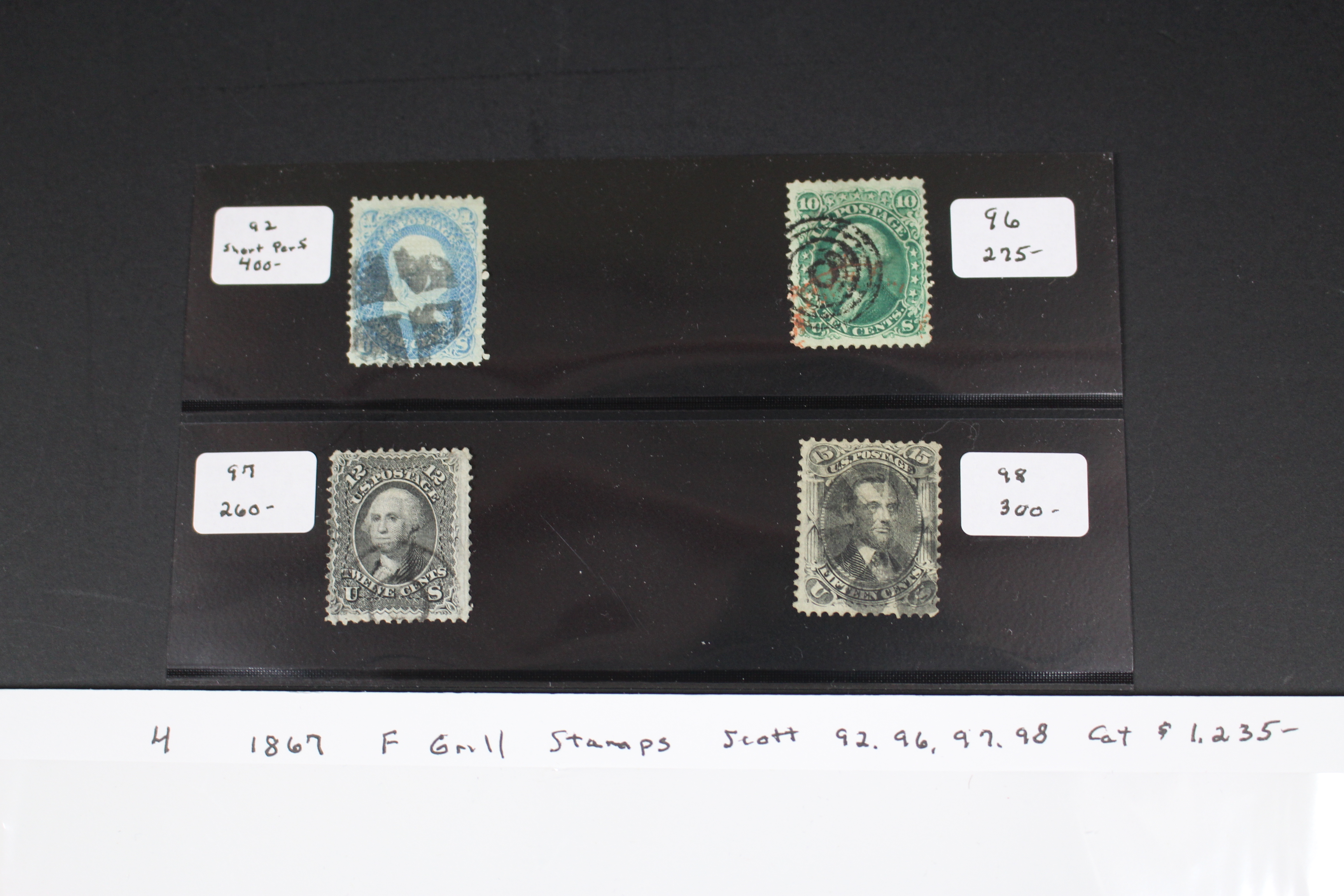 Four 1867 U.S. Postage Stamps with F Grill